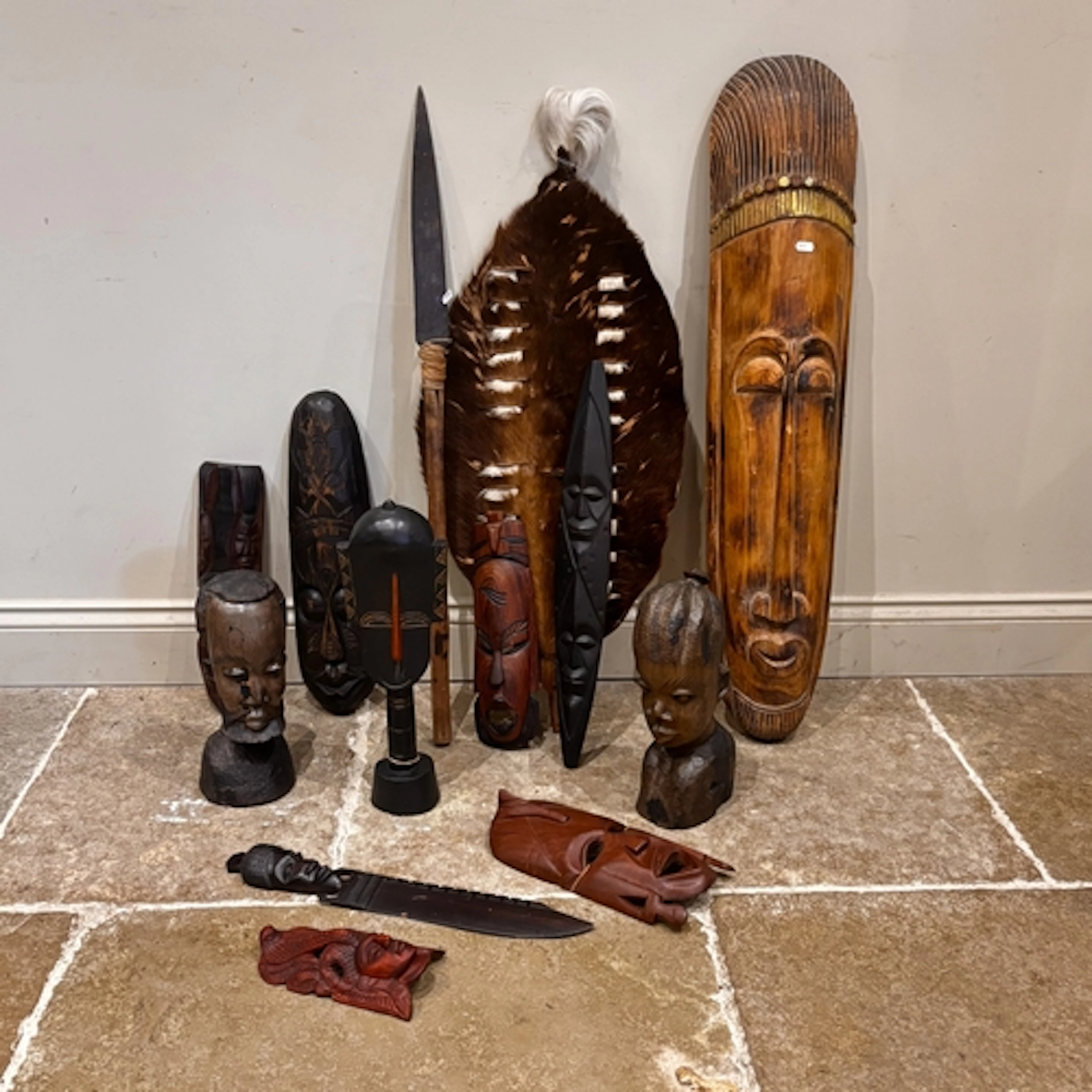 A quantity of tribal pieces, 20th century, to include a West...