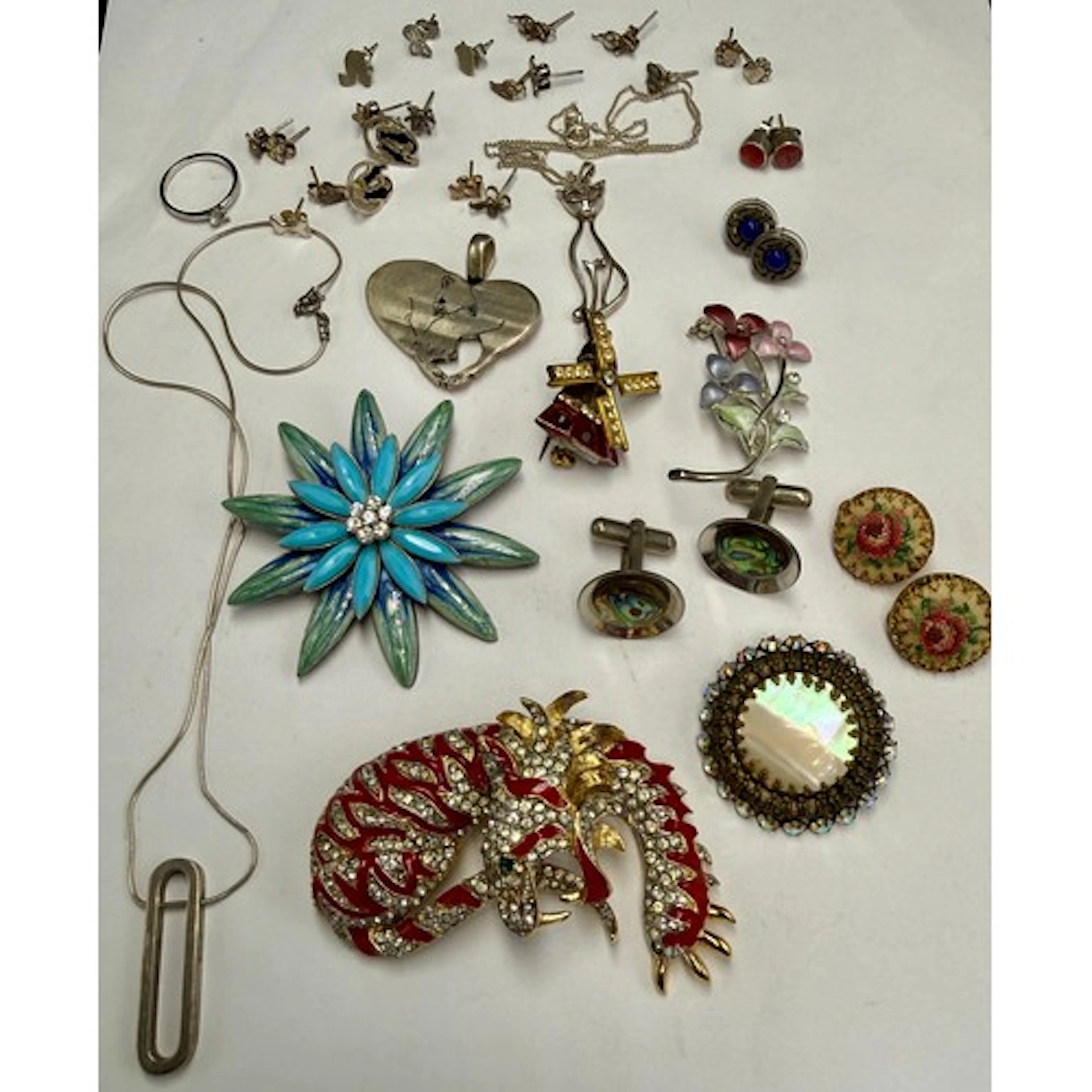 A collection of costume jewellery to include sterling silver...