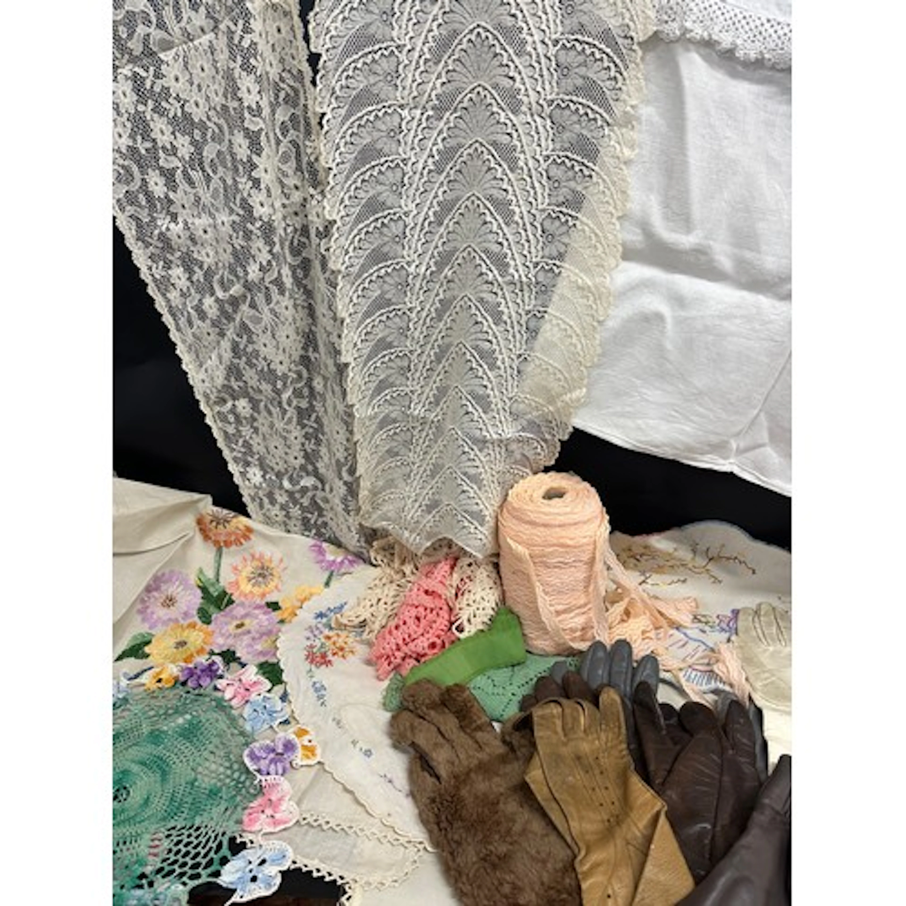 A collection of lace and vintage leather gloves *Not availa...