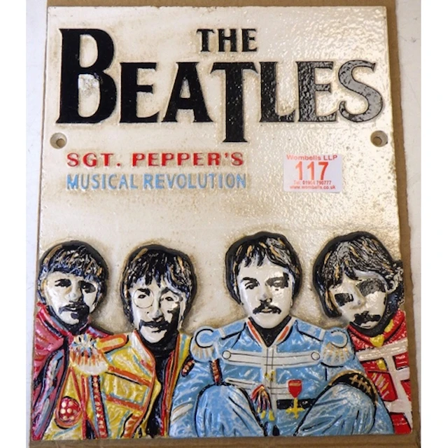 A cast 'The Beatles Sgt Pepper' sign, 28 x 23cm