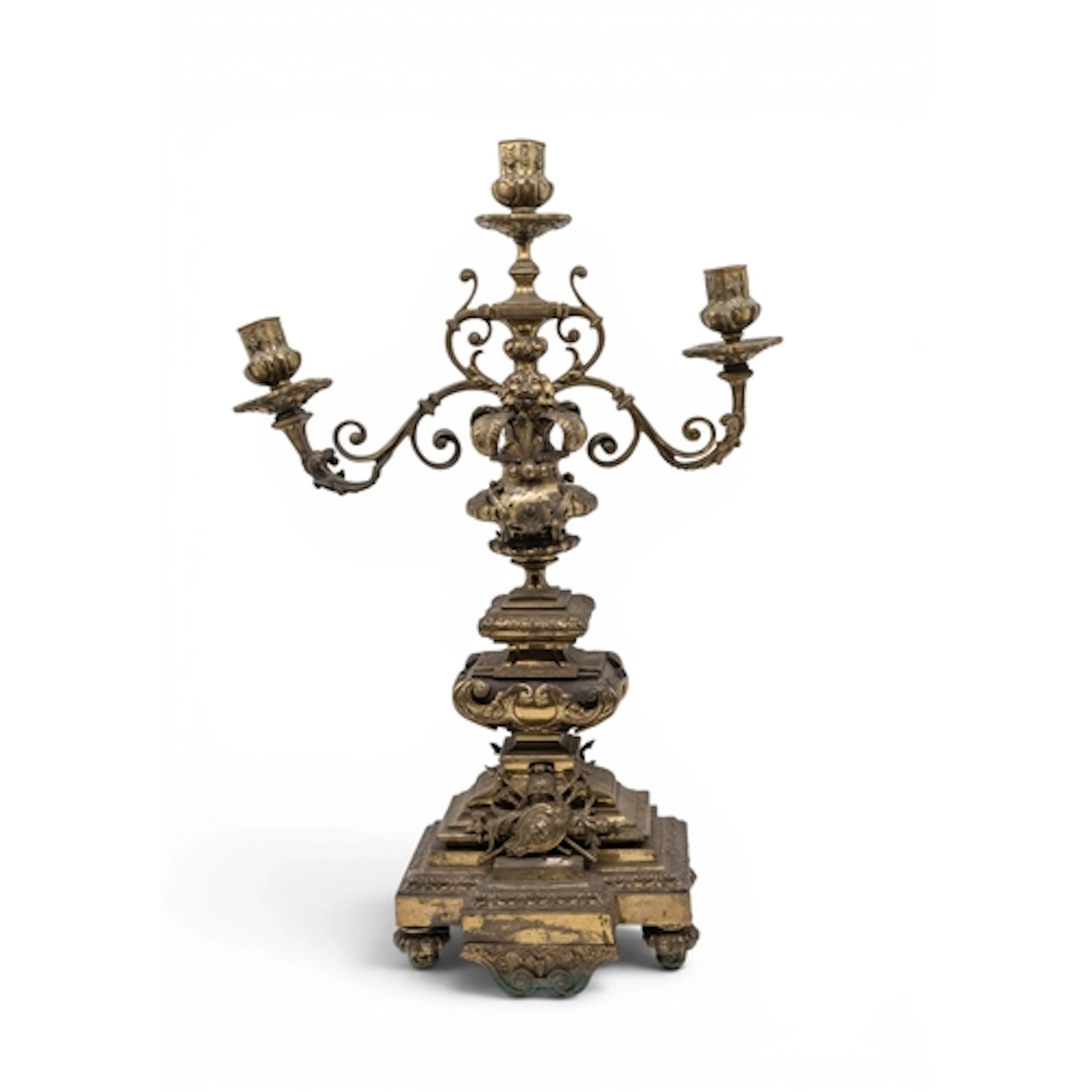 A GILT BRASS THREE BRANCH CANDELABRA decorated with a lion's...