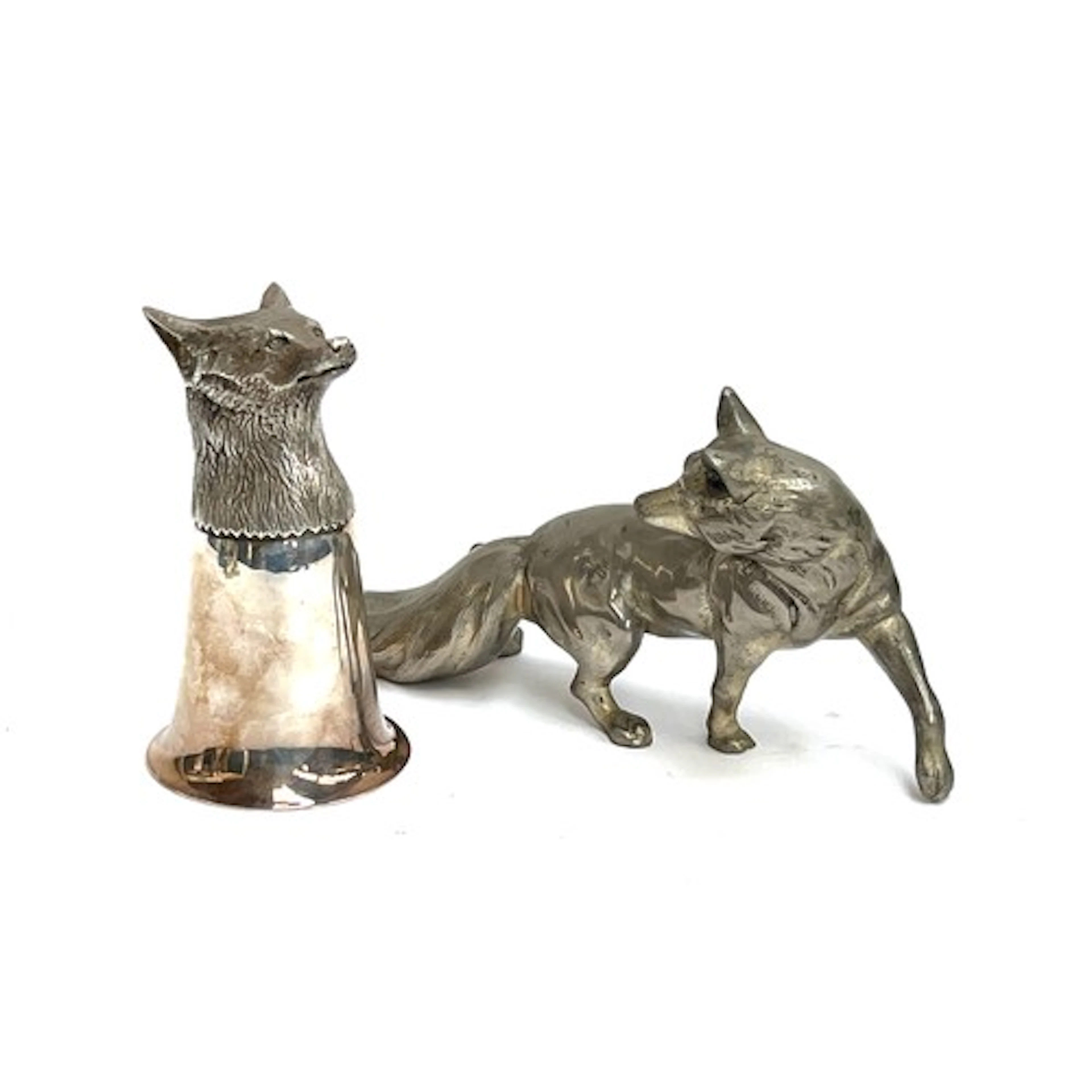 A silver plated and gilt fox mask stirrup cup, 12cmH; togeth...