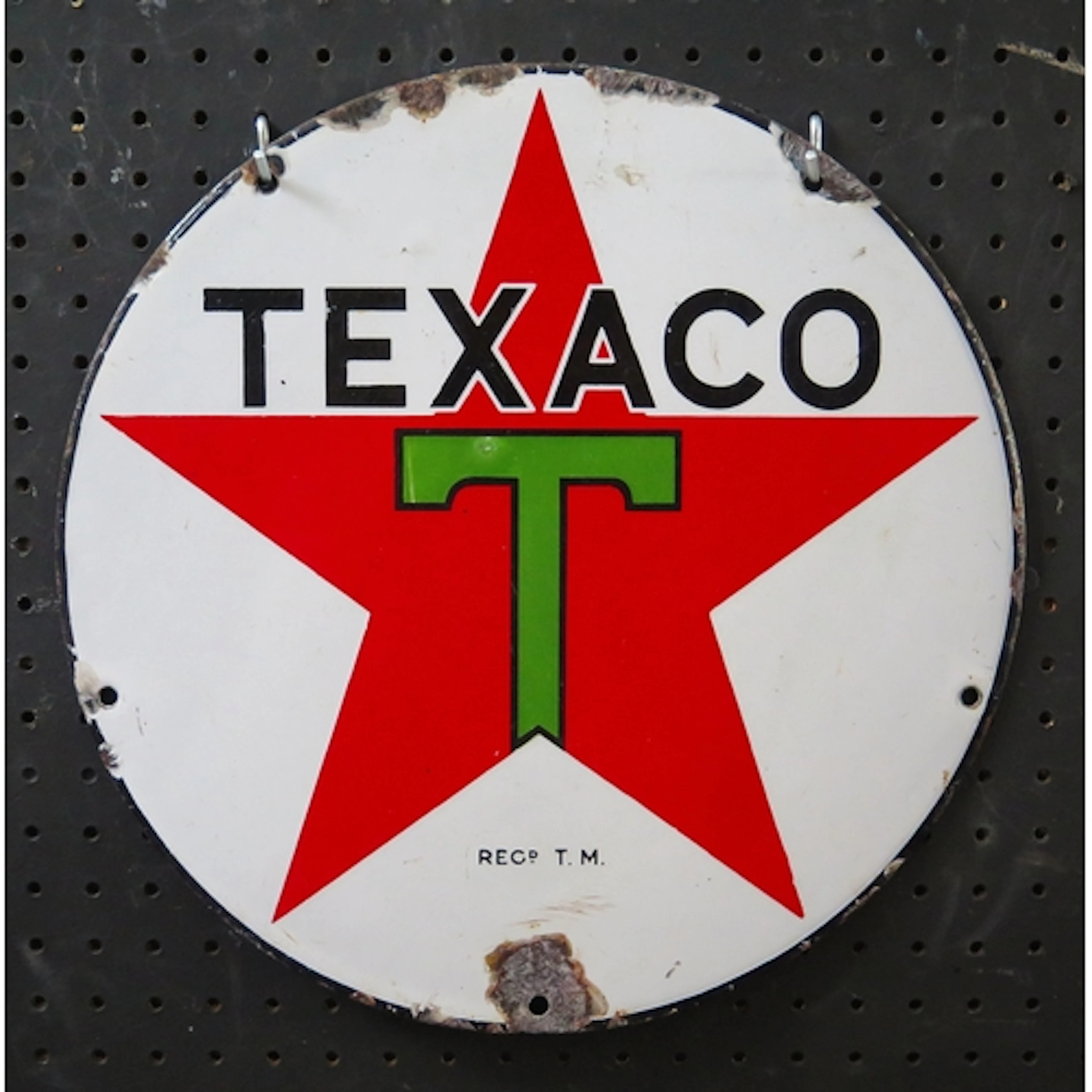 "Texaco" an enamel circular advertising sign, 30.5cm diamete...