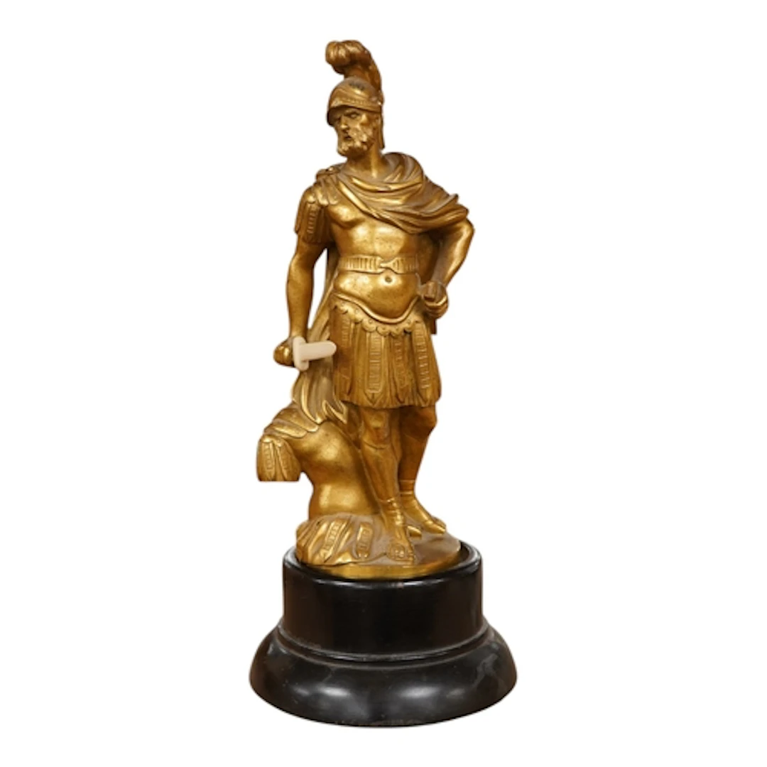 A 19th century ormolu figure of a Roman warrior, ebonised pl...