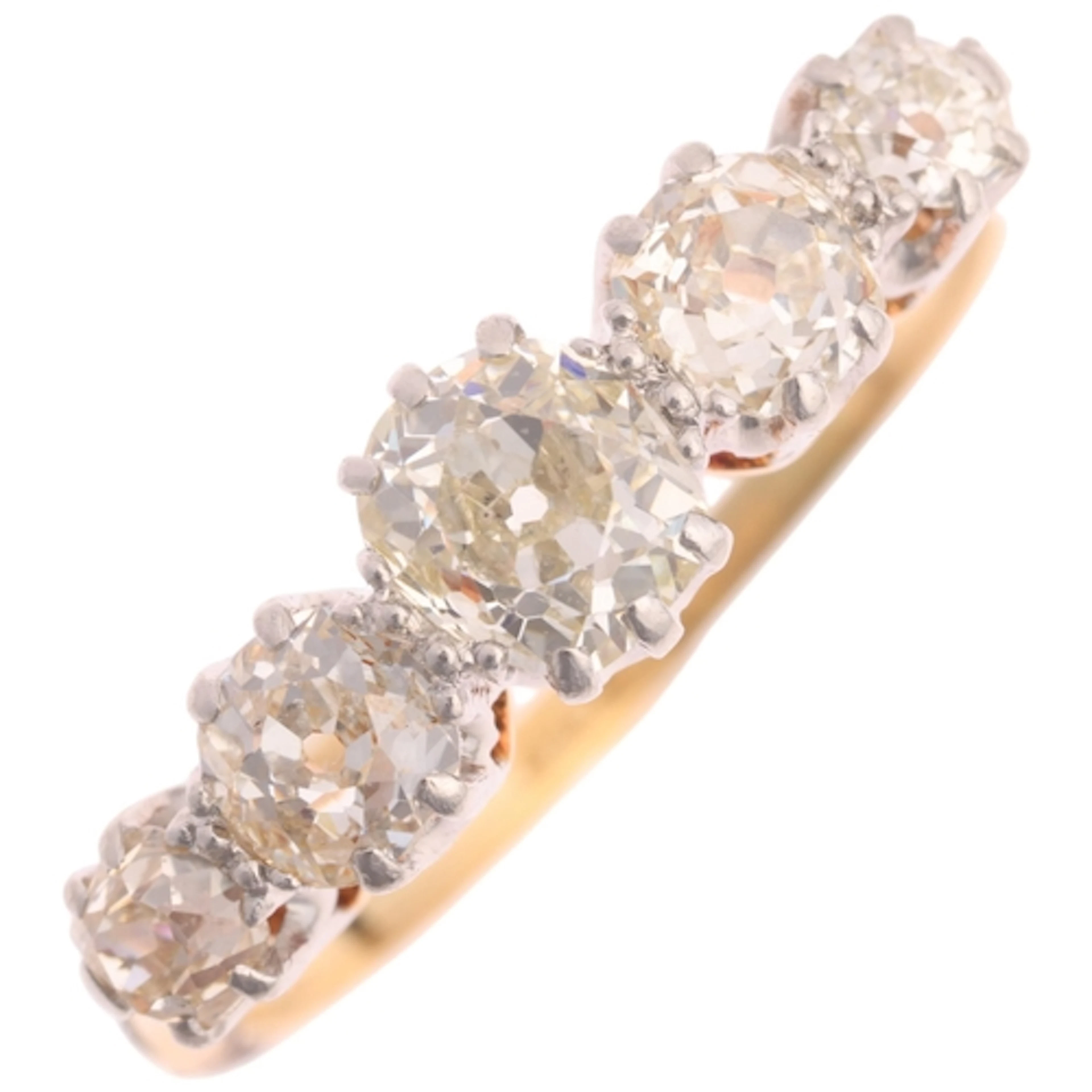 An 18ct gold five stone diamond ring, platinum-topped claw s...