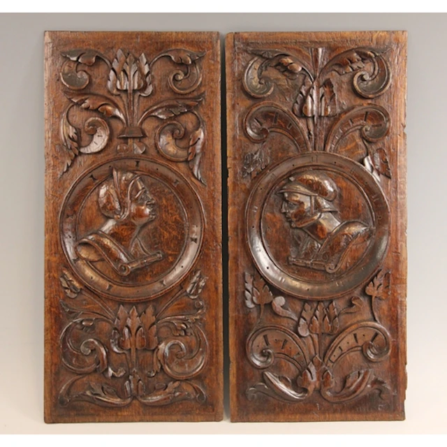 A pair of 16th century style carved oak bas-relief Romayne-t...