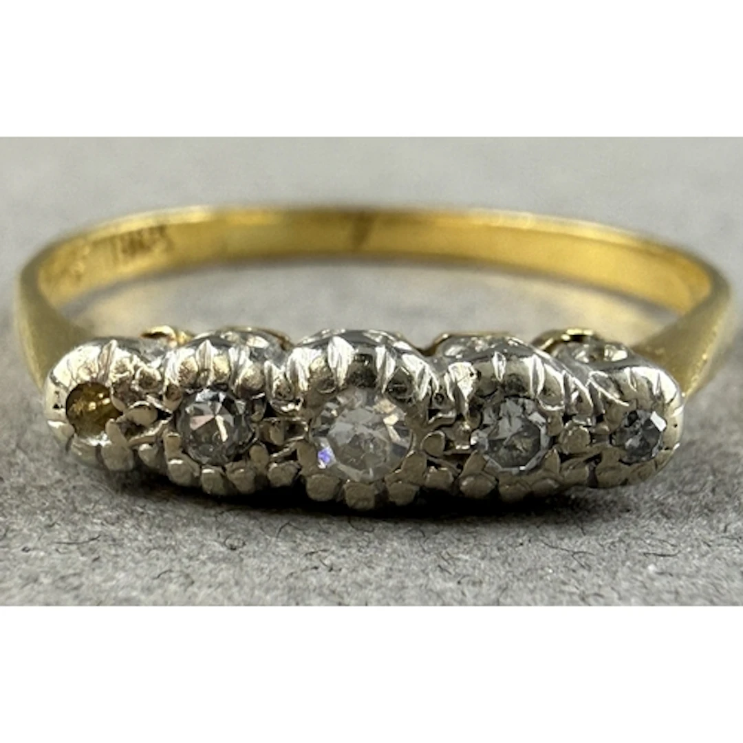Jewellery: a yellow metal and diamond ring, marked 18ct and ...