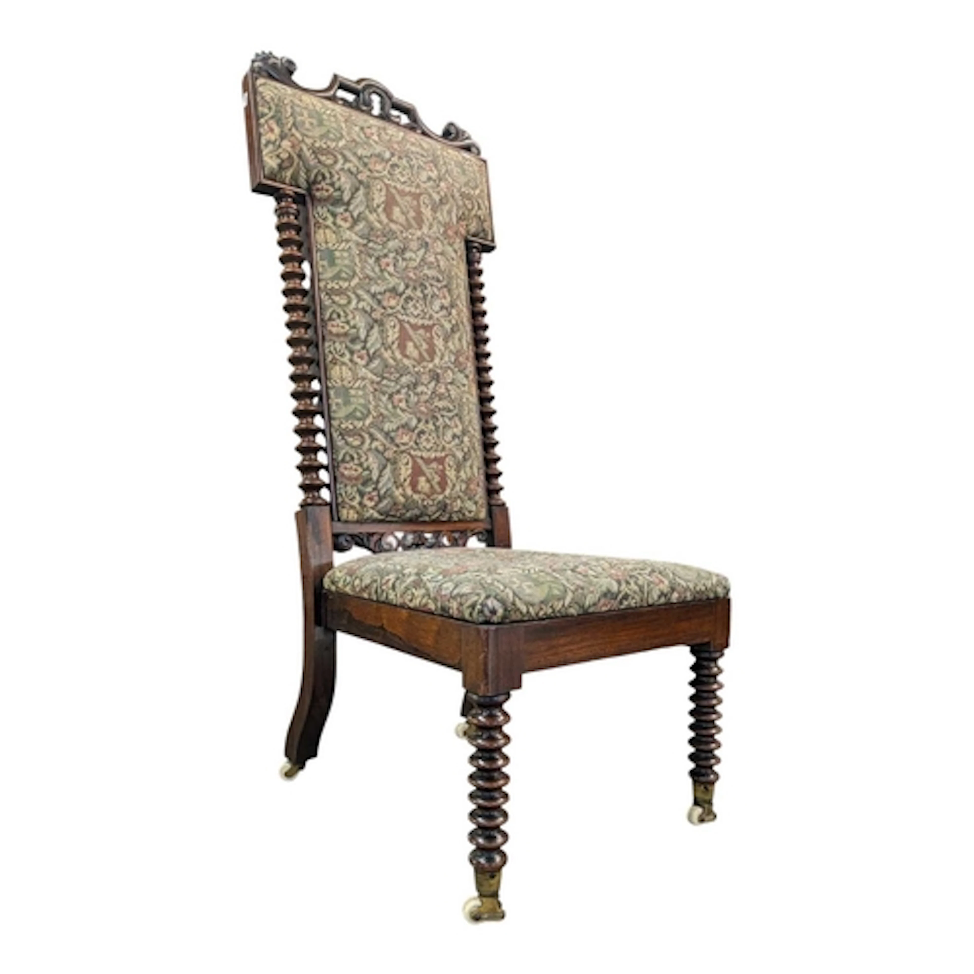 A 19th century Victorian high back mahogany chair. Raised on...