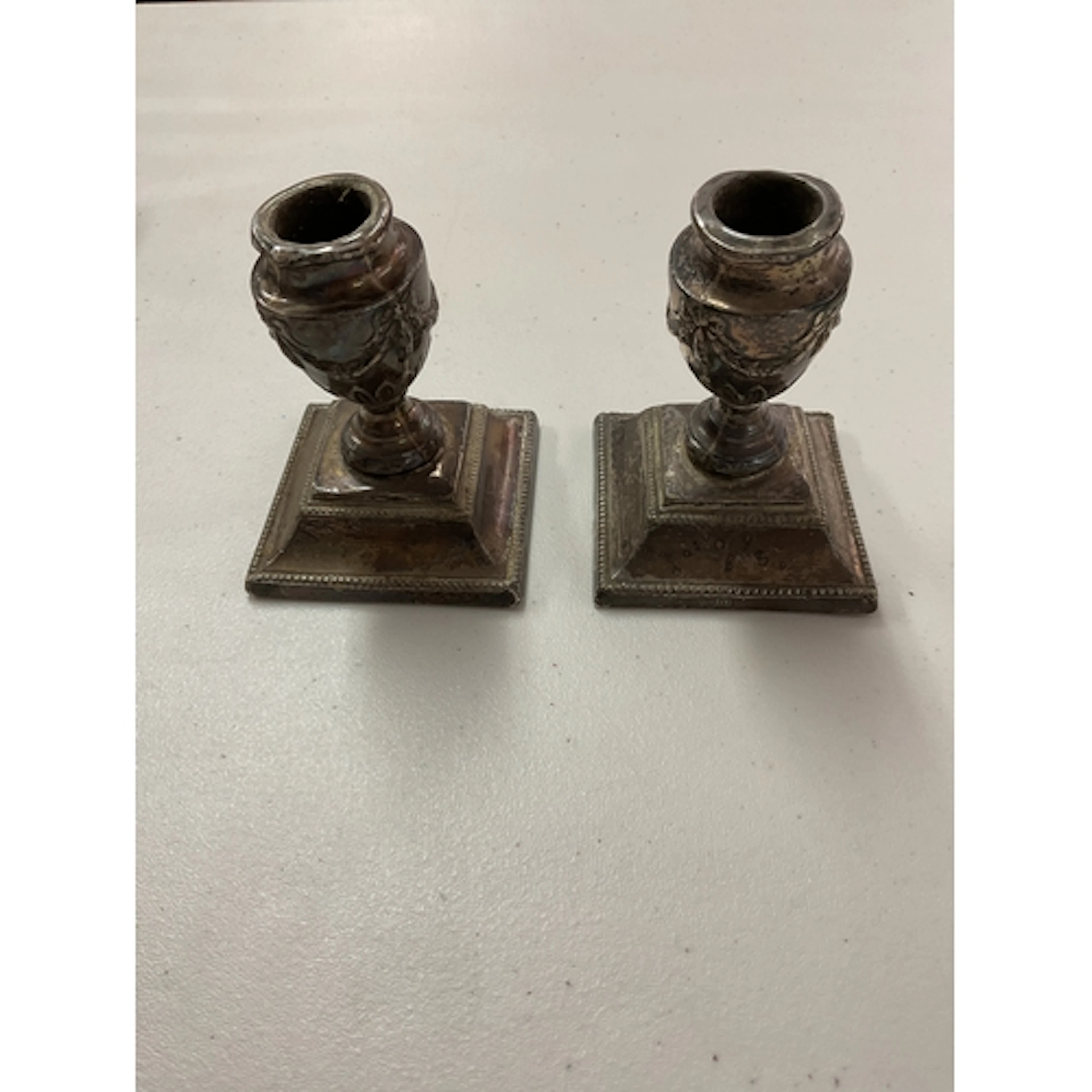 Pair Silver Victorian squat candlesticks with weighted bases...