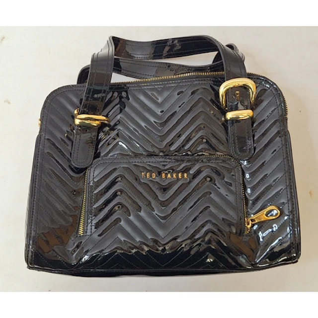 Ted Baker Black Patent Handbag, with stitched detail and gol...