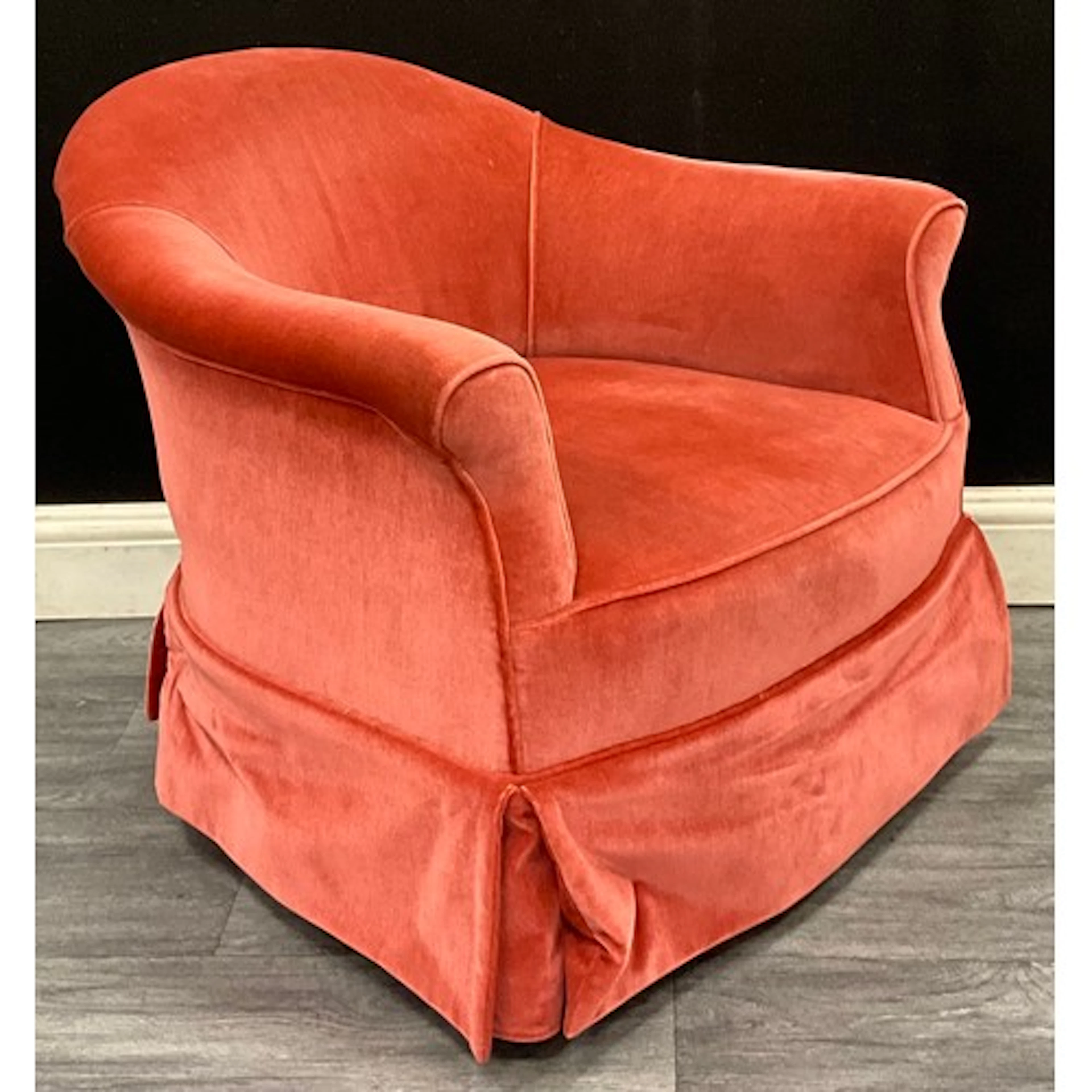 A Victorian velvet club armchair with low curved backrest, s...