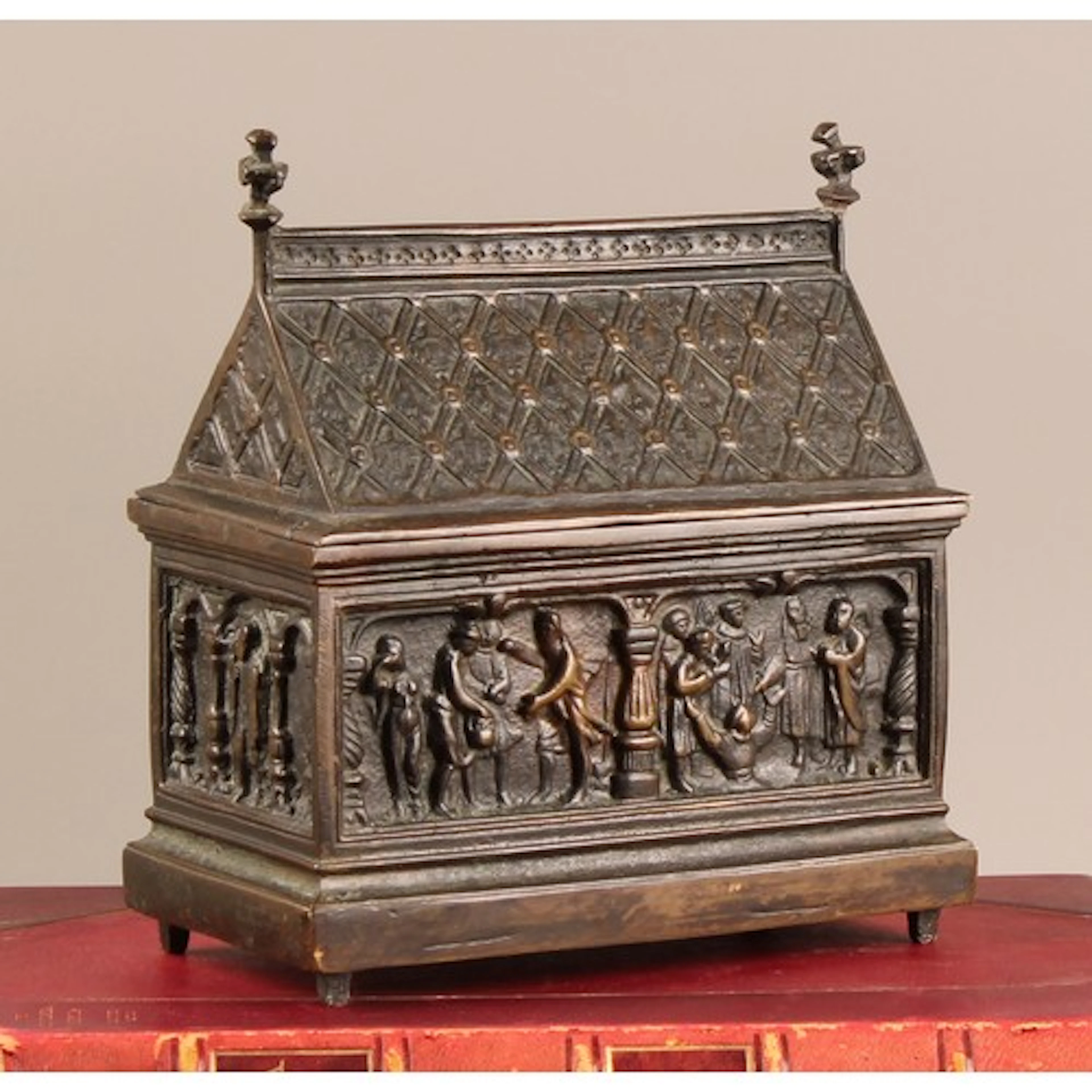 A Medieval Revival bronze chasse, cast with figures in an ar...