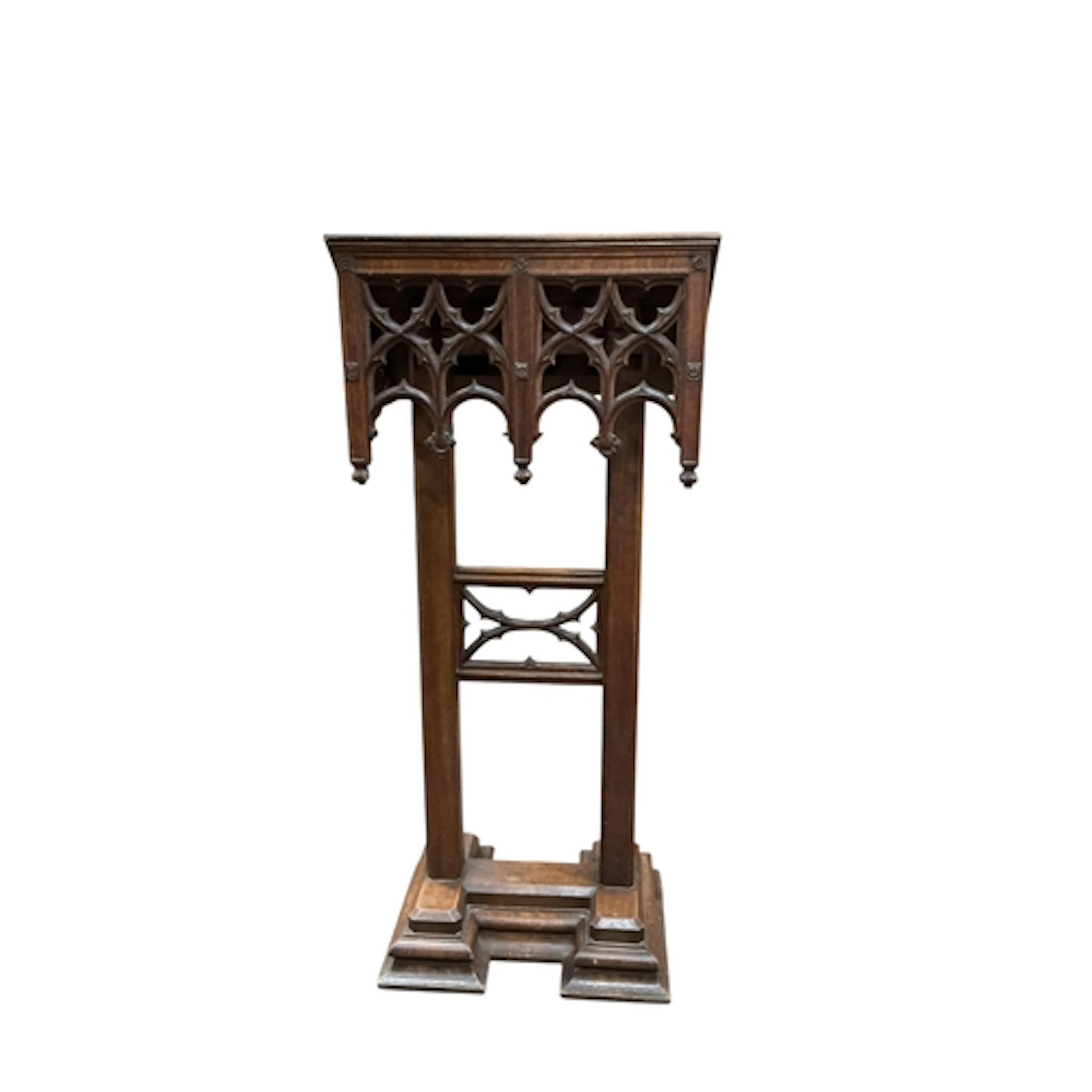 A Victorian Gothic Revival oak lectern, with carved dedicati...
