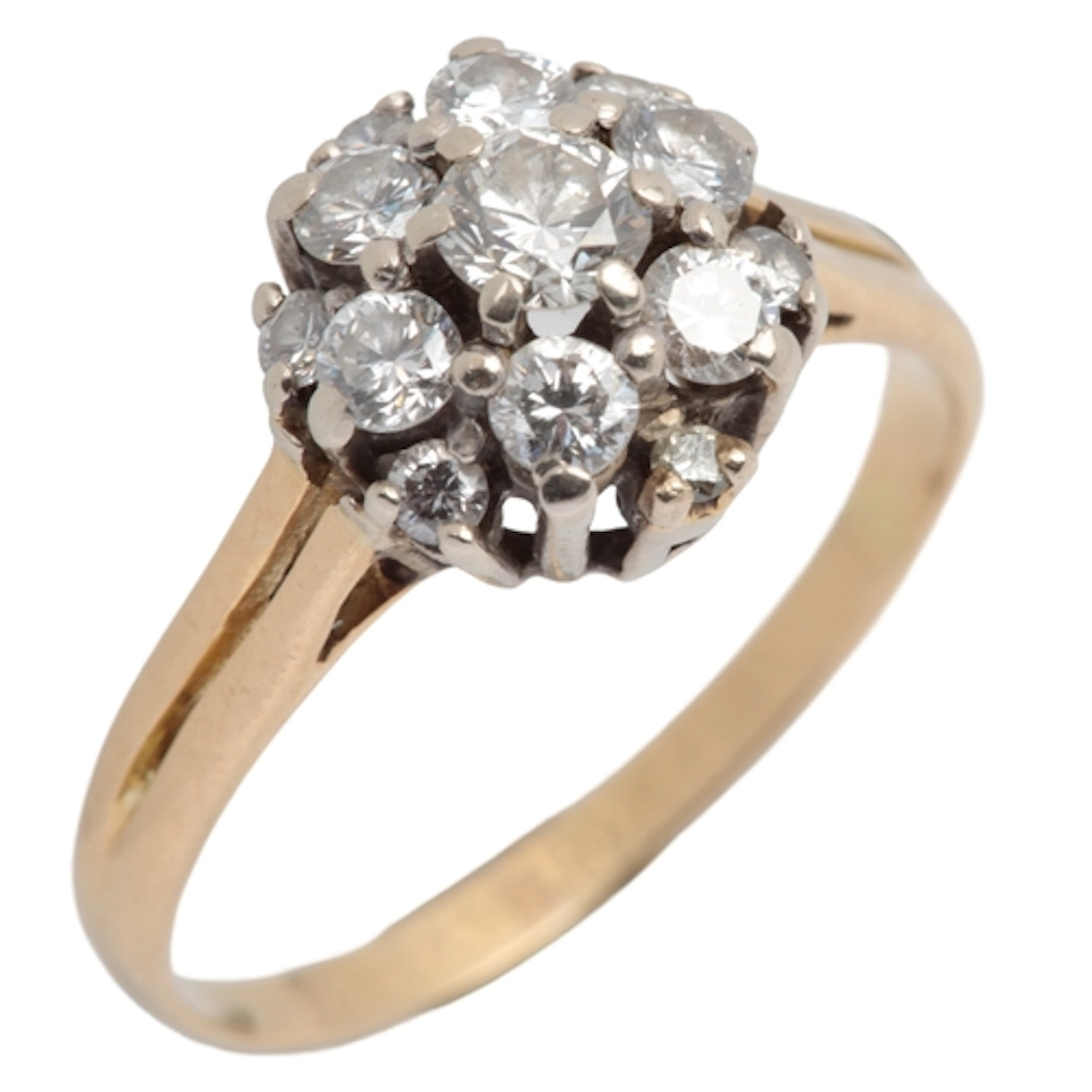 A diamond cluster ring, claw-set with brilliant-cut diamonds...