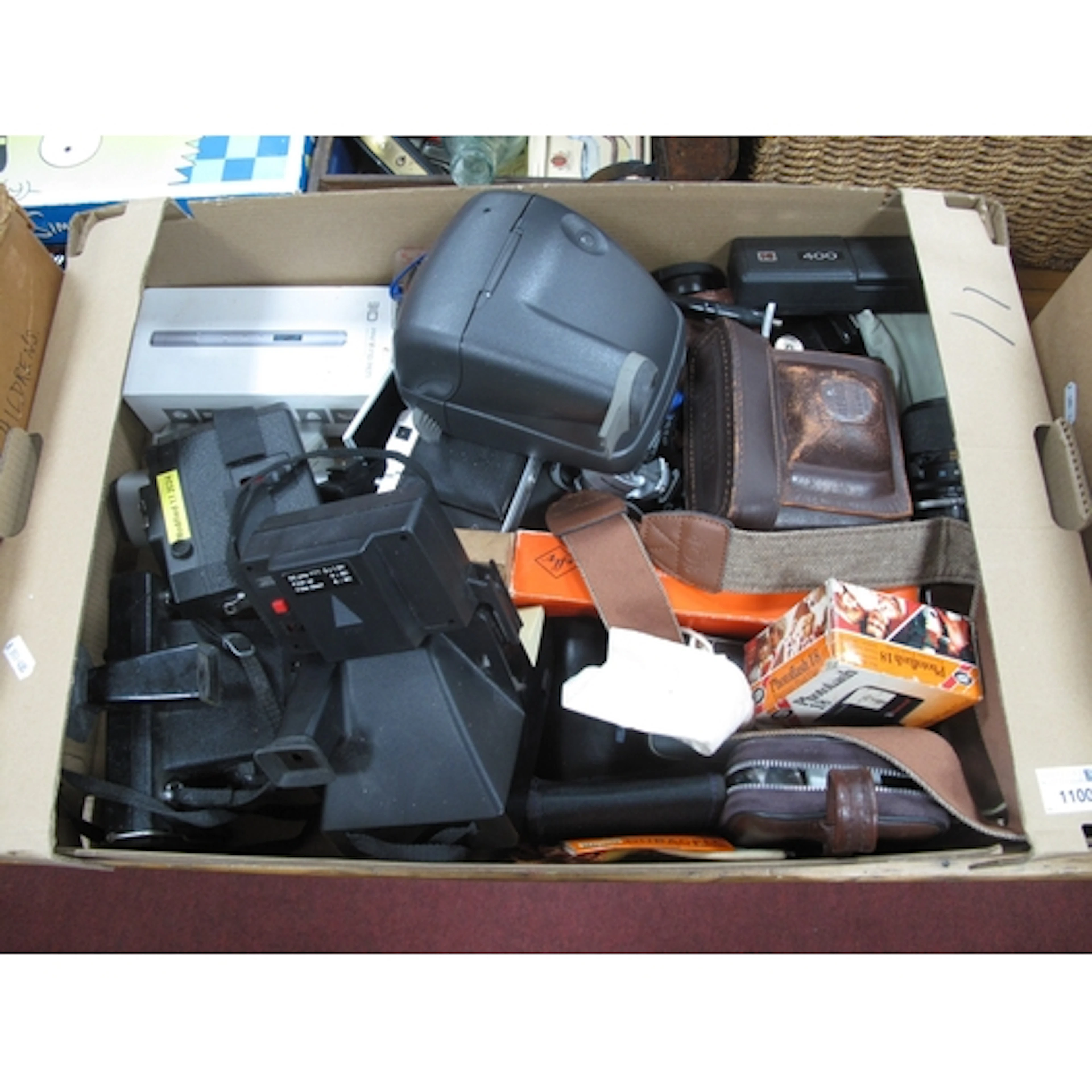 A Large Collection of Cameras to include a Polaroid Cool Cam...