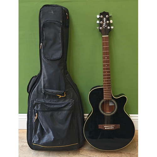A Takamine G Series model EG260C-BL black lacquered electro ...