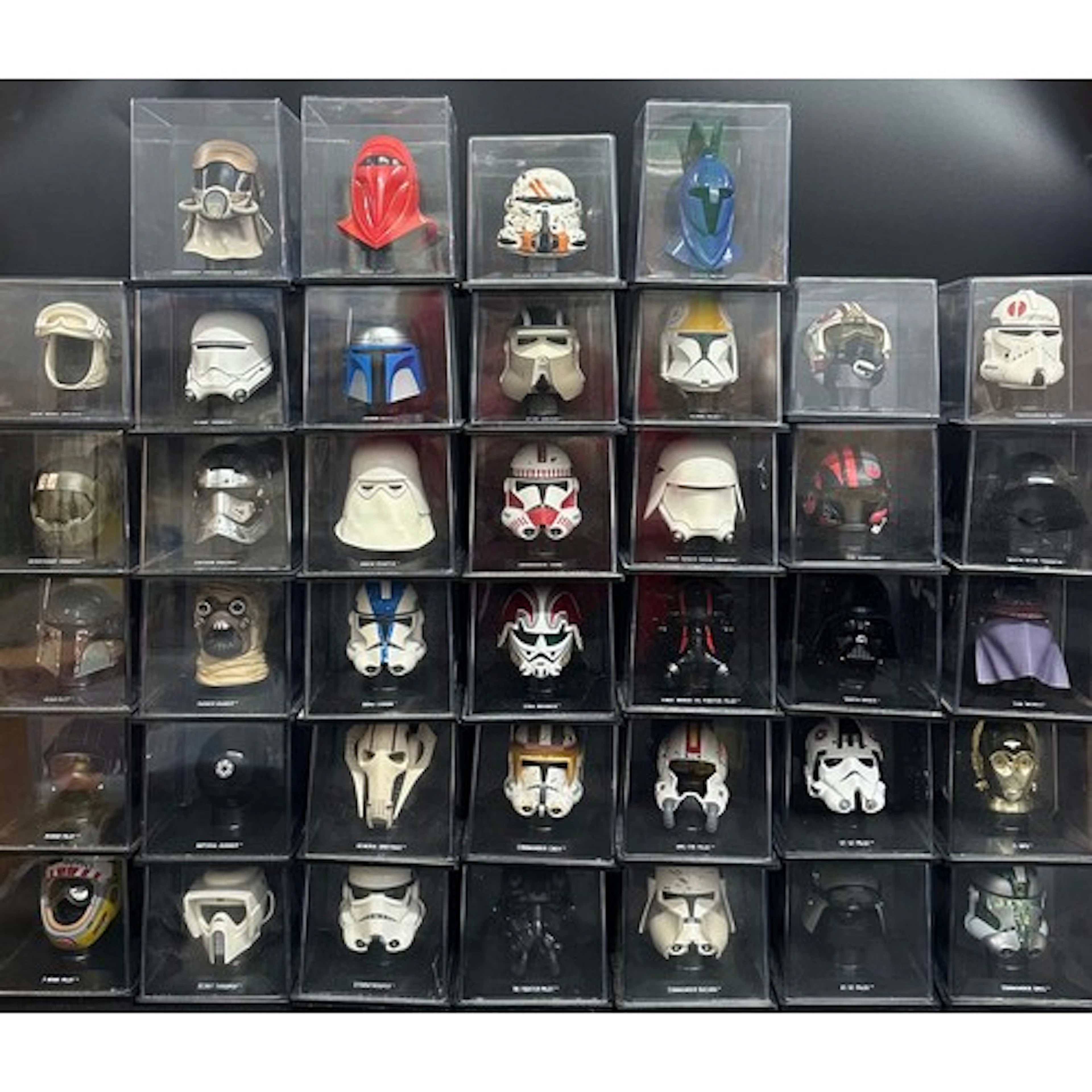 Thirty-nine Star Wars replica helmets including Darth Vader,...