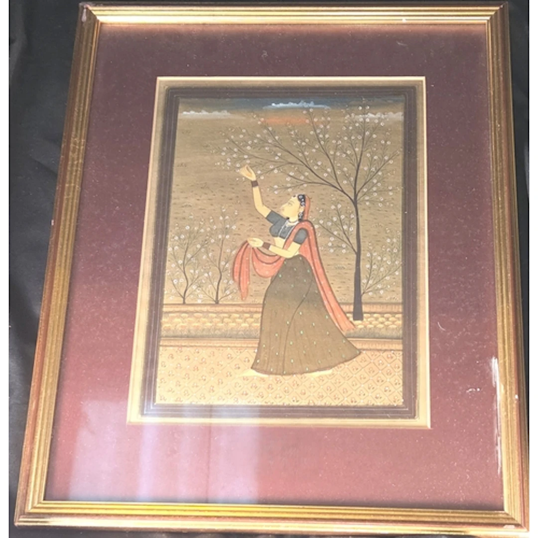 A late 19th century Indian painting of woman in traditional ...