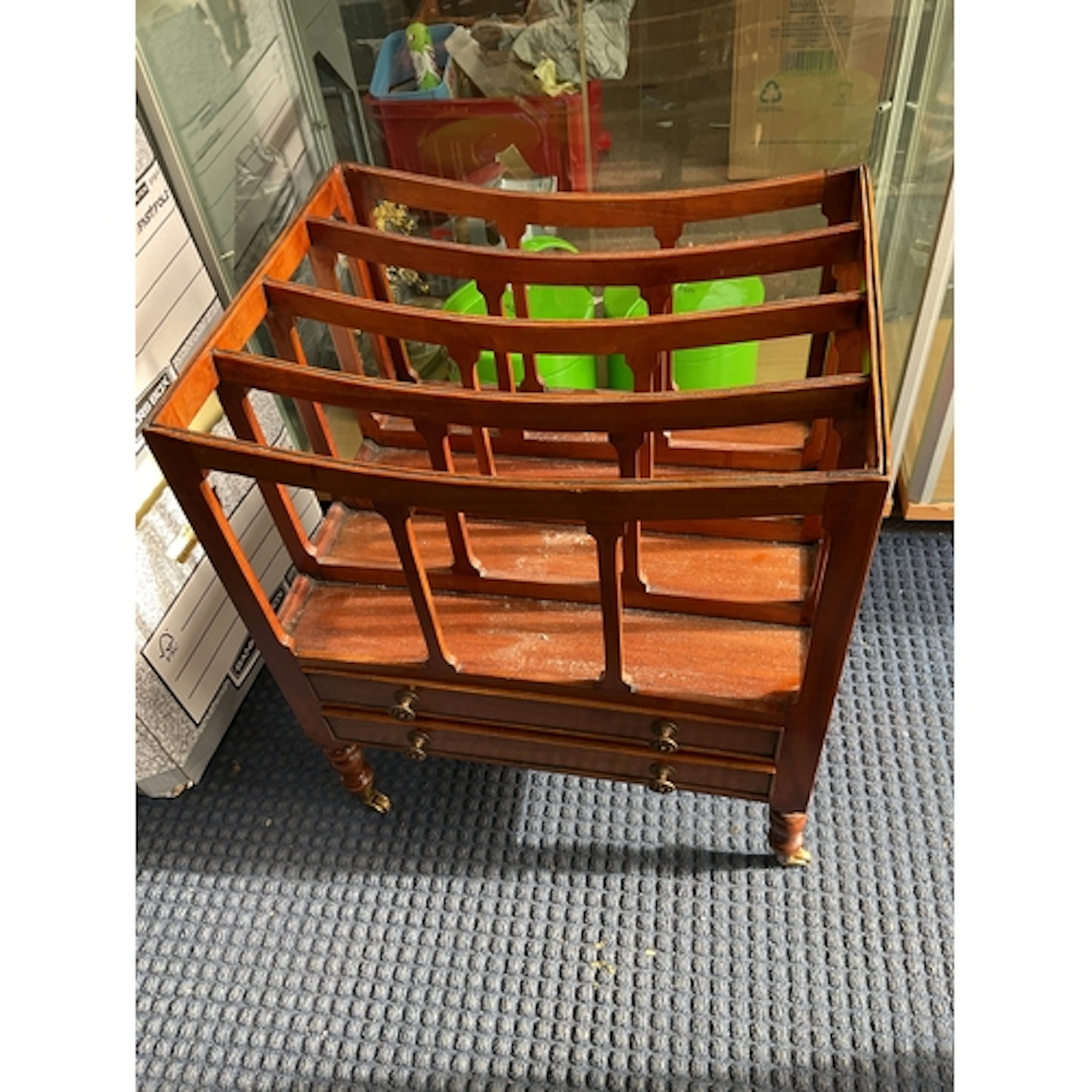 Mahogany Canterbury on brass coaster feet.