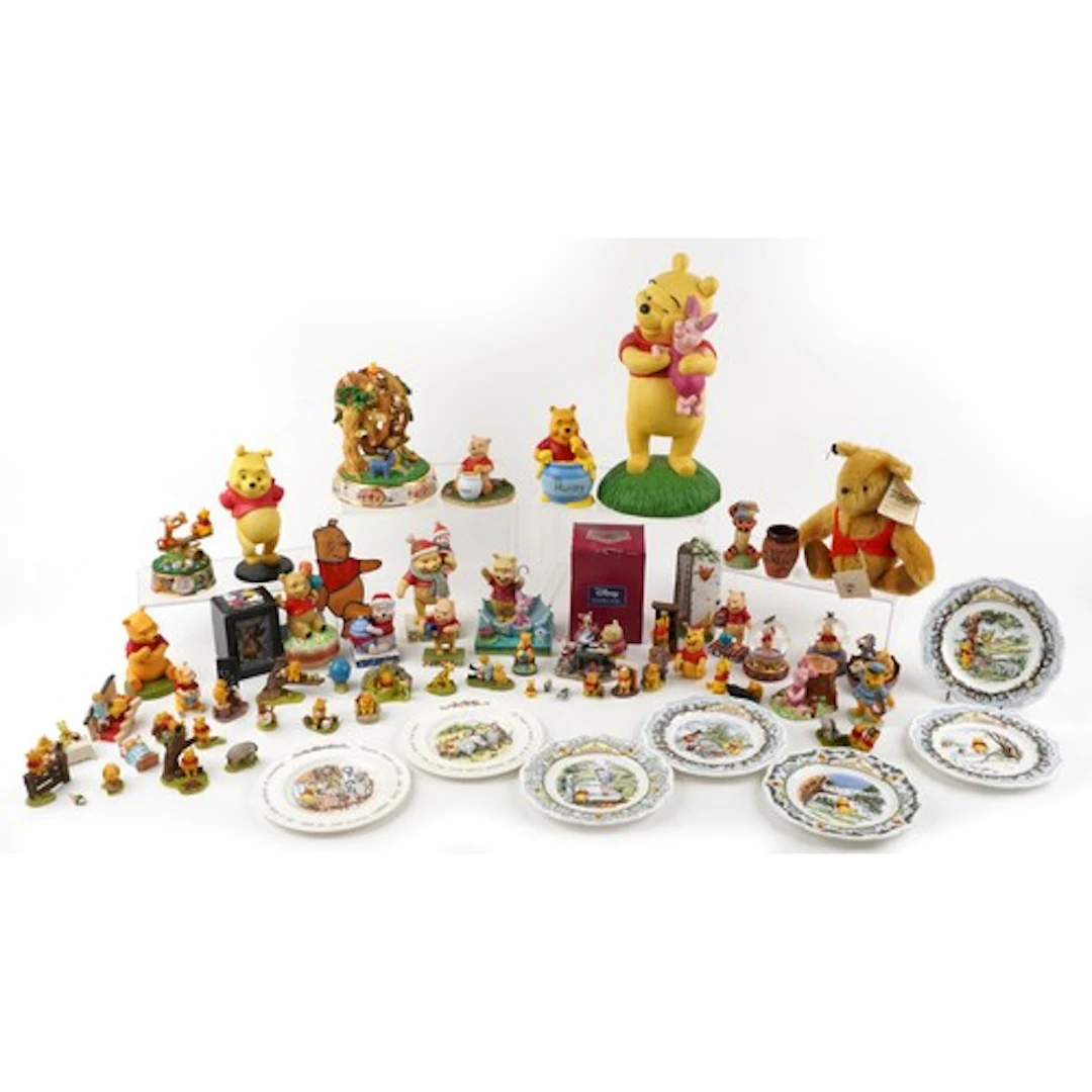 Large collection of Winnie the Pooh collectable figures incl...