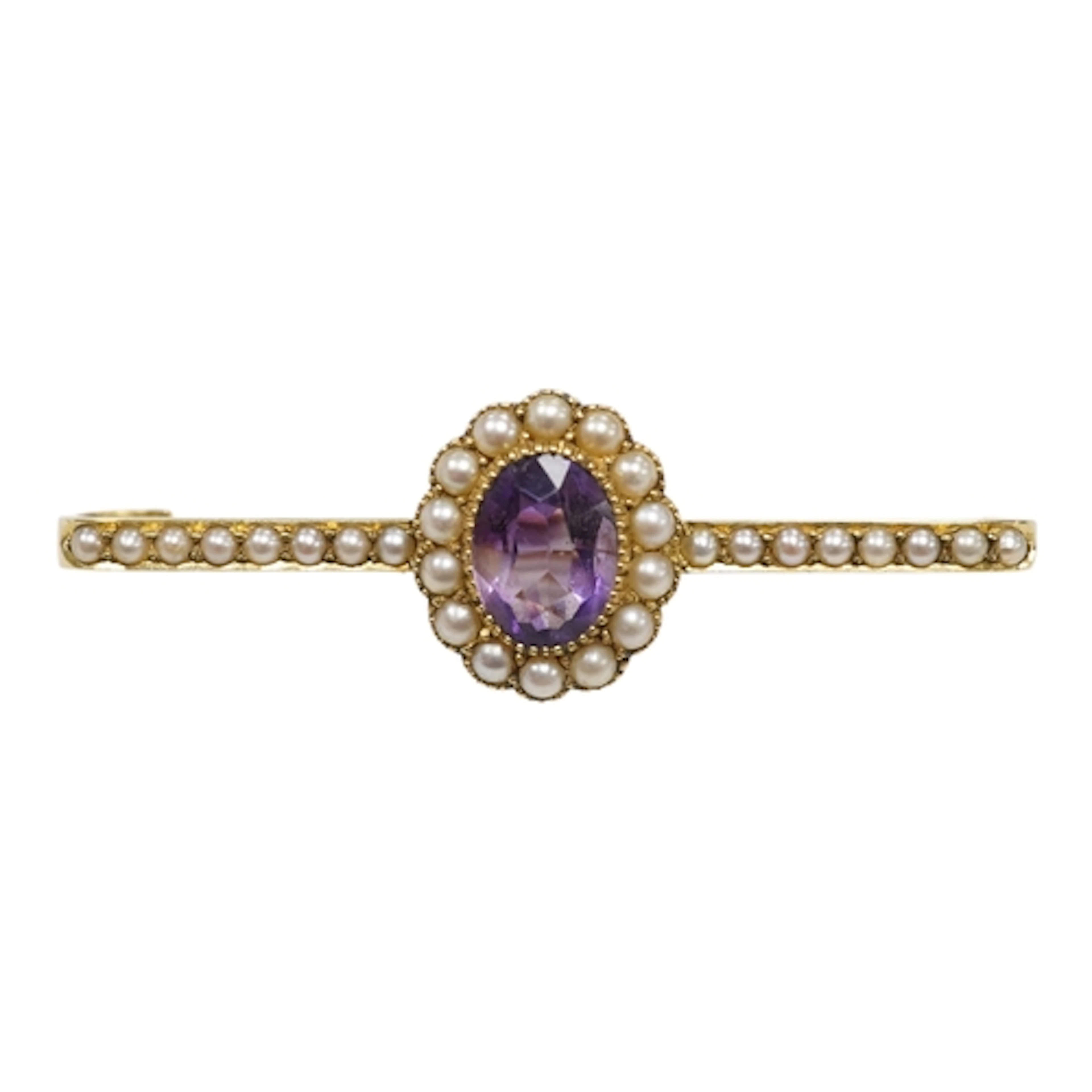 A yellow metal, amethyst and seed pearl cluster set bar broo...