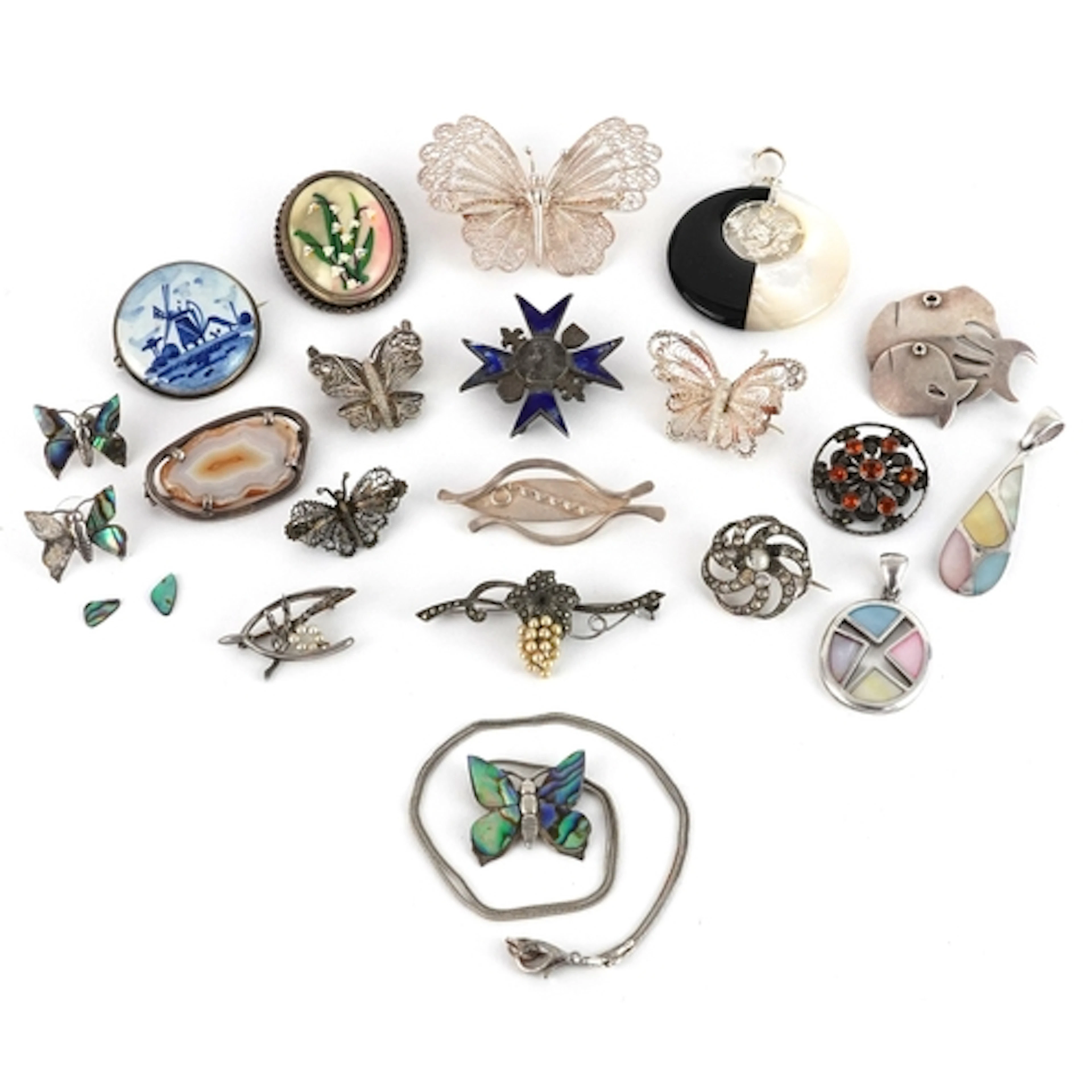 Silver and white metal brooches, pendants and earrings inclu...