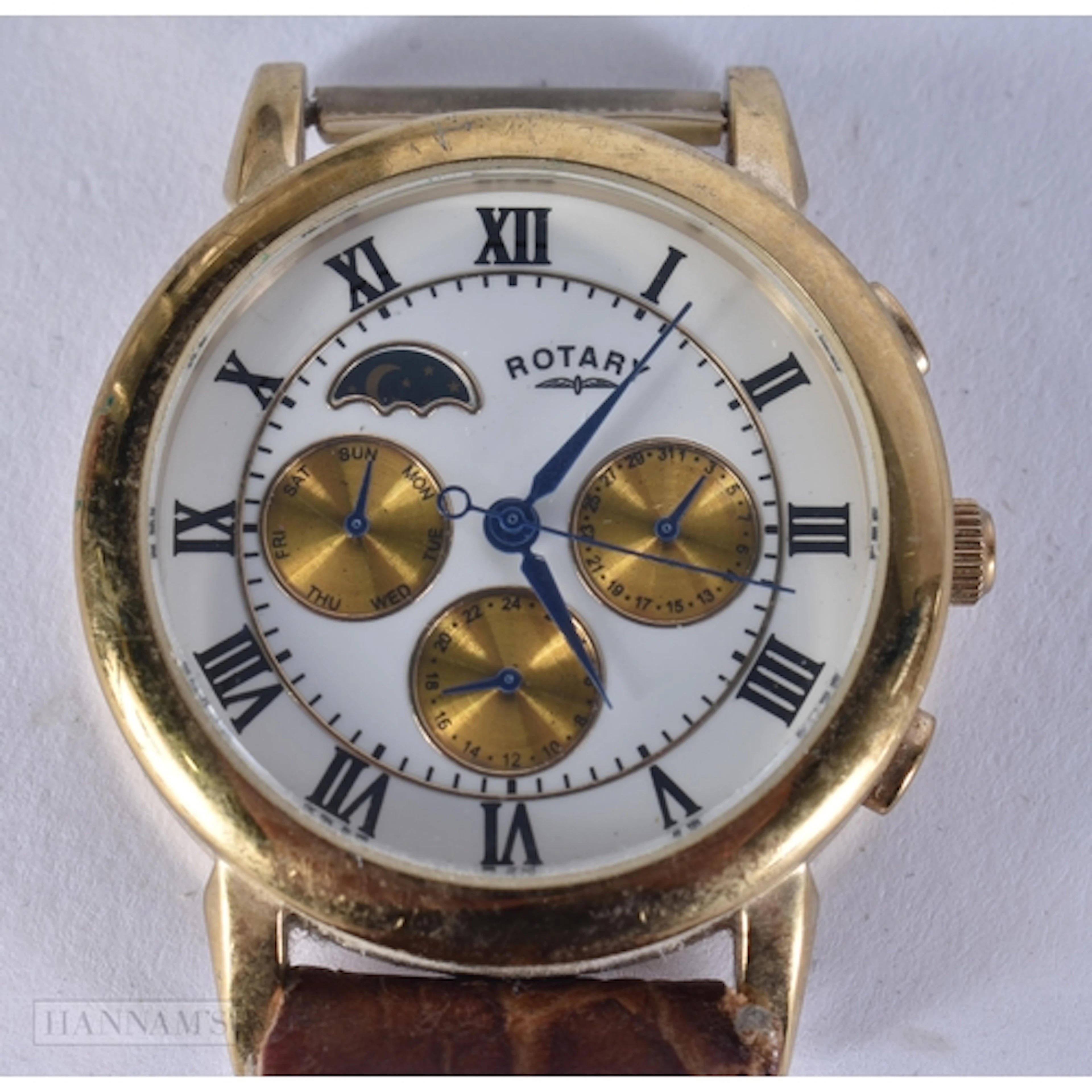 A ROTARY MOONPHASE WATCH. 4.2 cm including crown. running