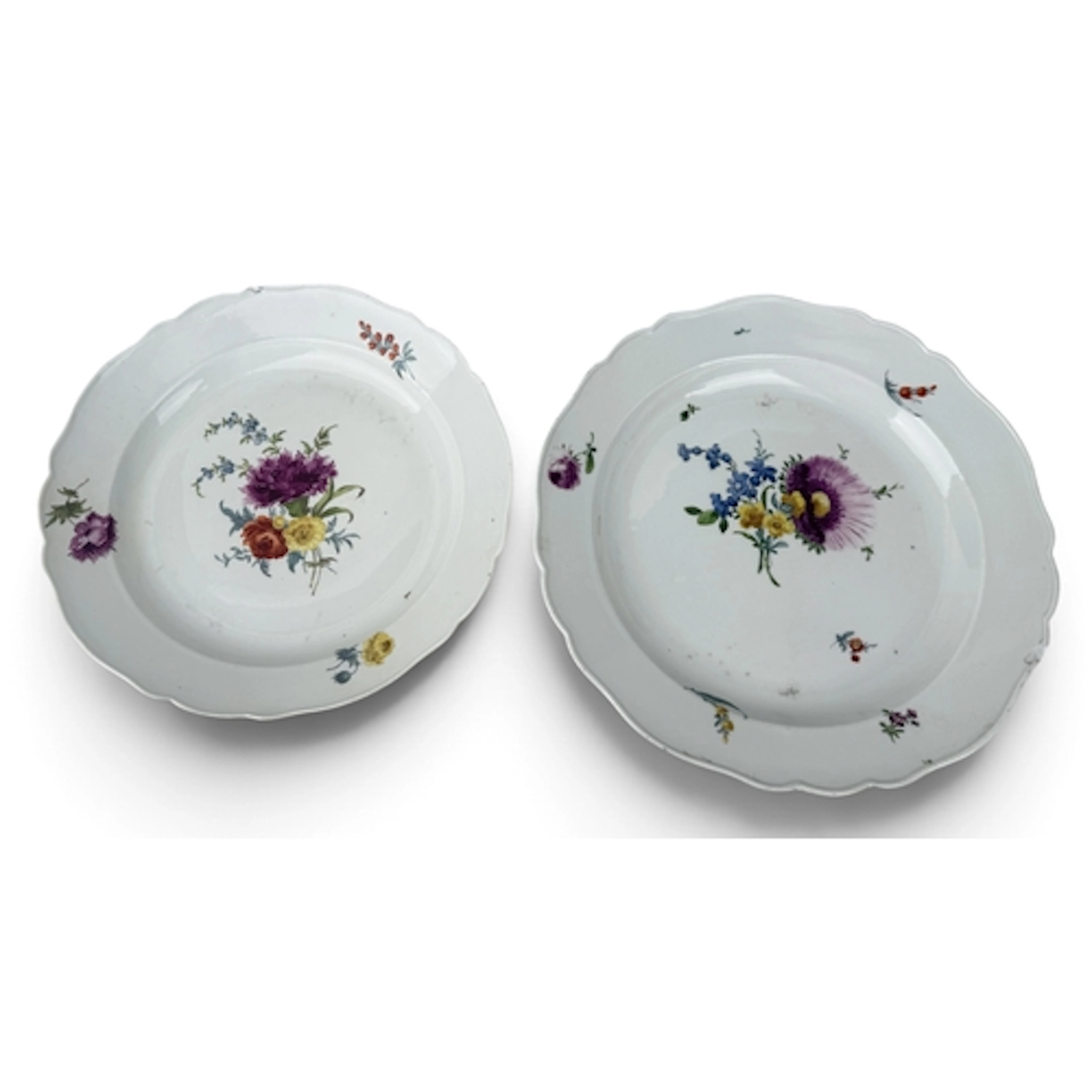 A MATCHED PAIR OF MEISSEN PORCELAIN PLATES Each with two cro...