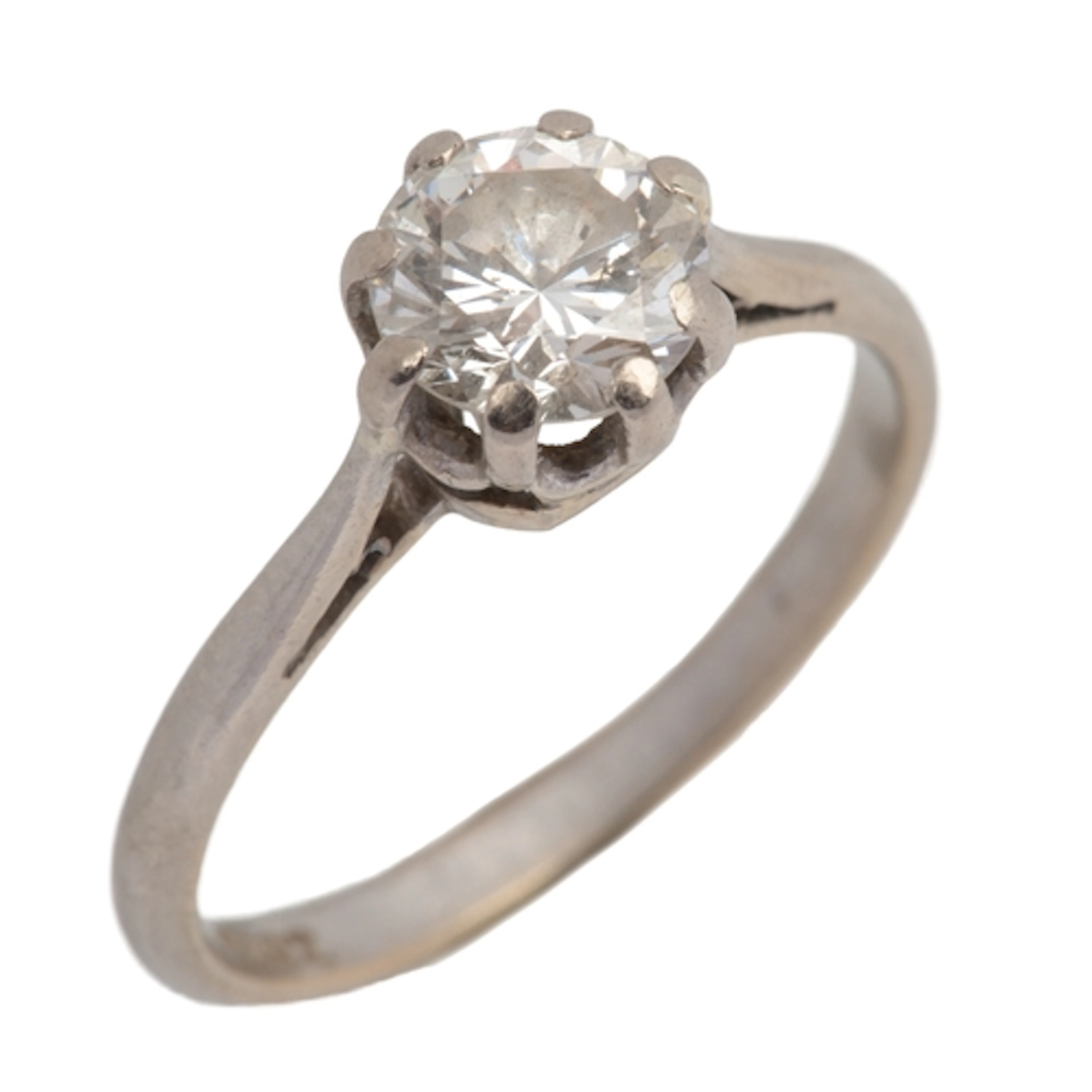 A solitaire diamond ring, claw-set with a brilliant-cut diam...