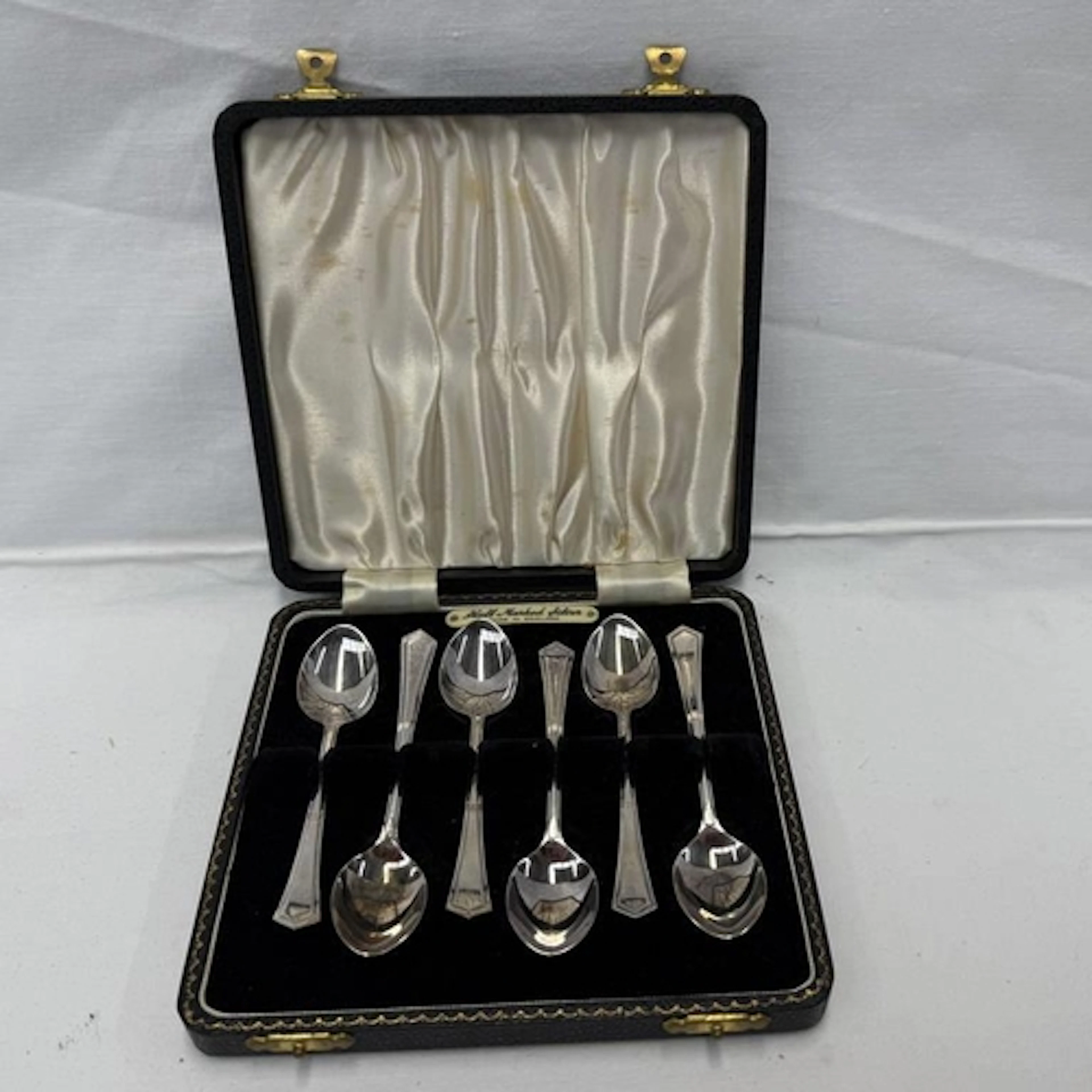 A CASED SET OF 6 SILVER COFFEE SPOONS BY ANGORA SILVER PLATE...