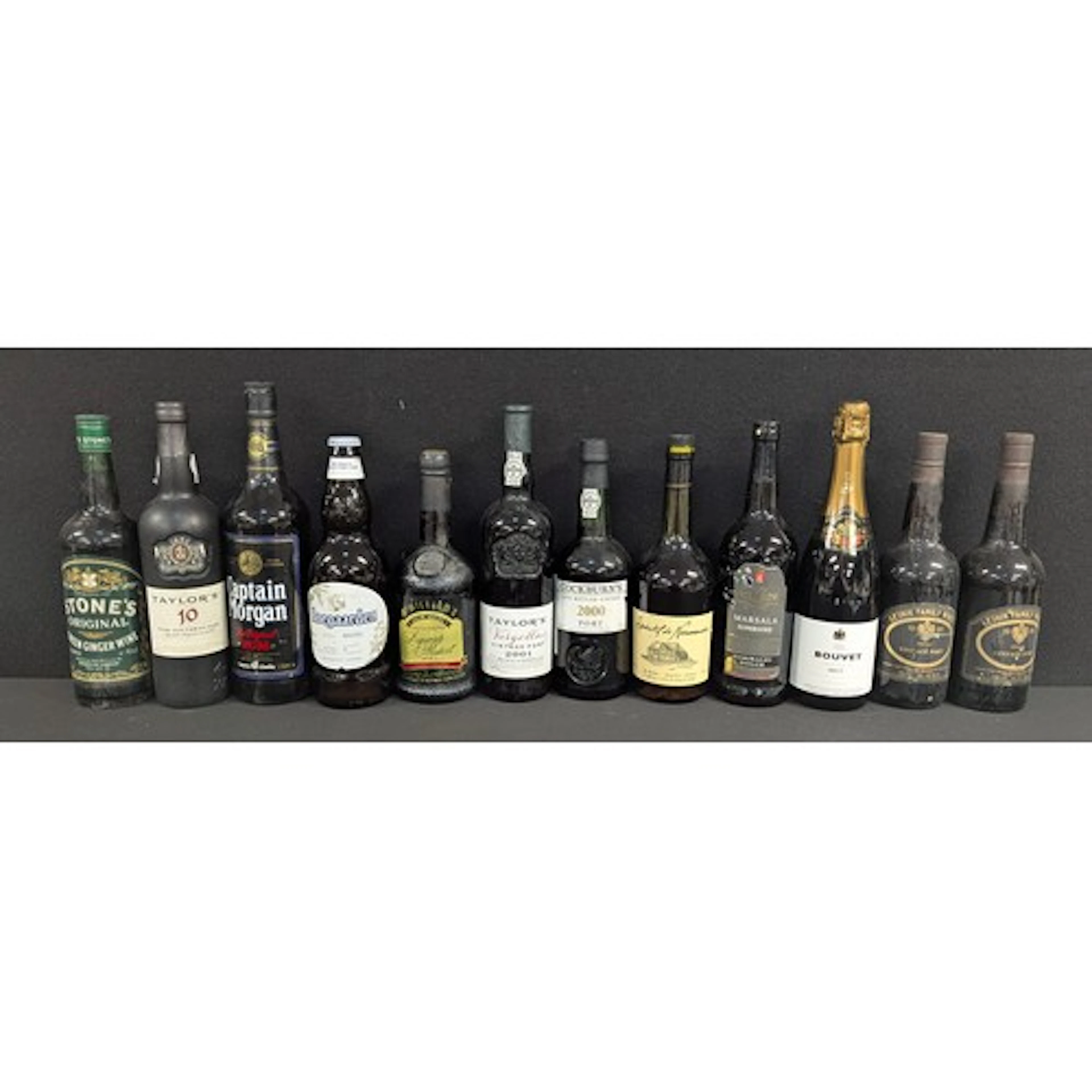 Wines & Spirits - A quantity of port, wine, rum & beer to in...