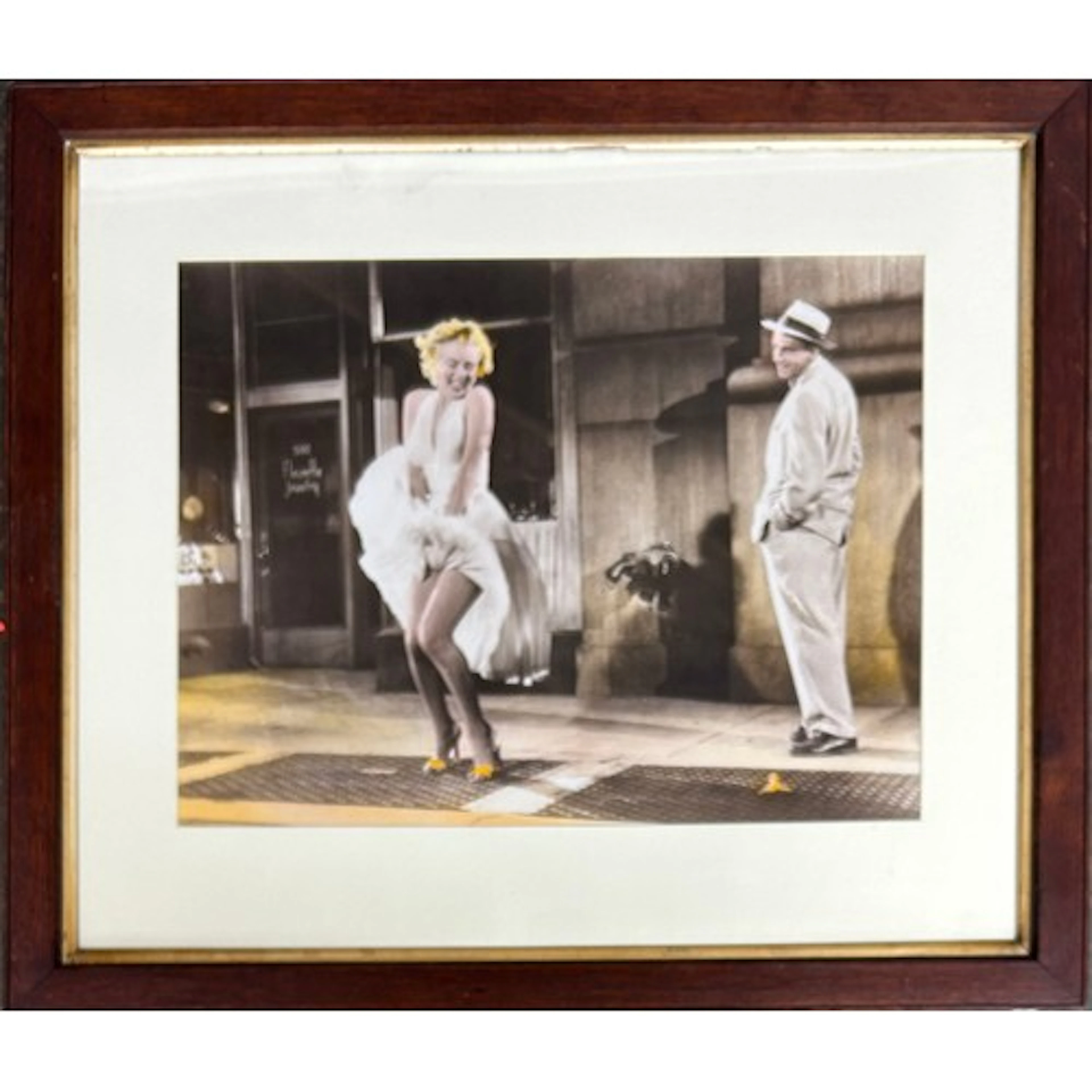 A framed print of the iconic scene with Marilyn Monroe and T...