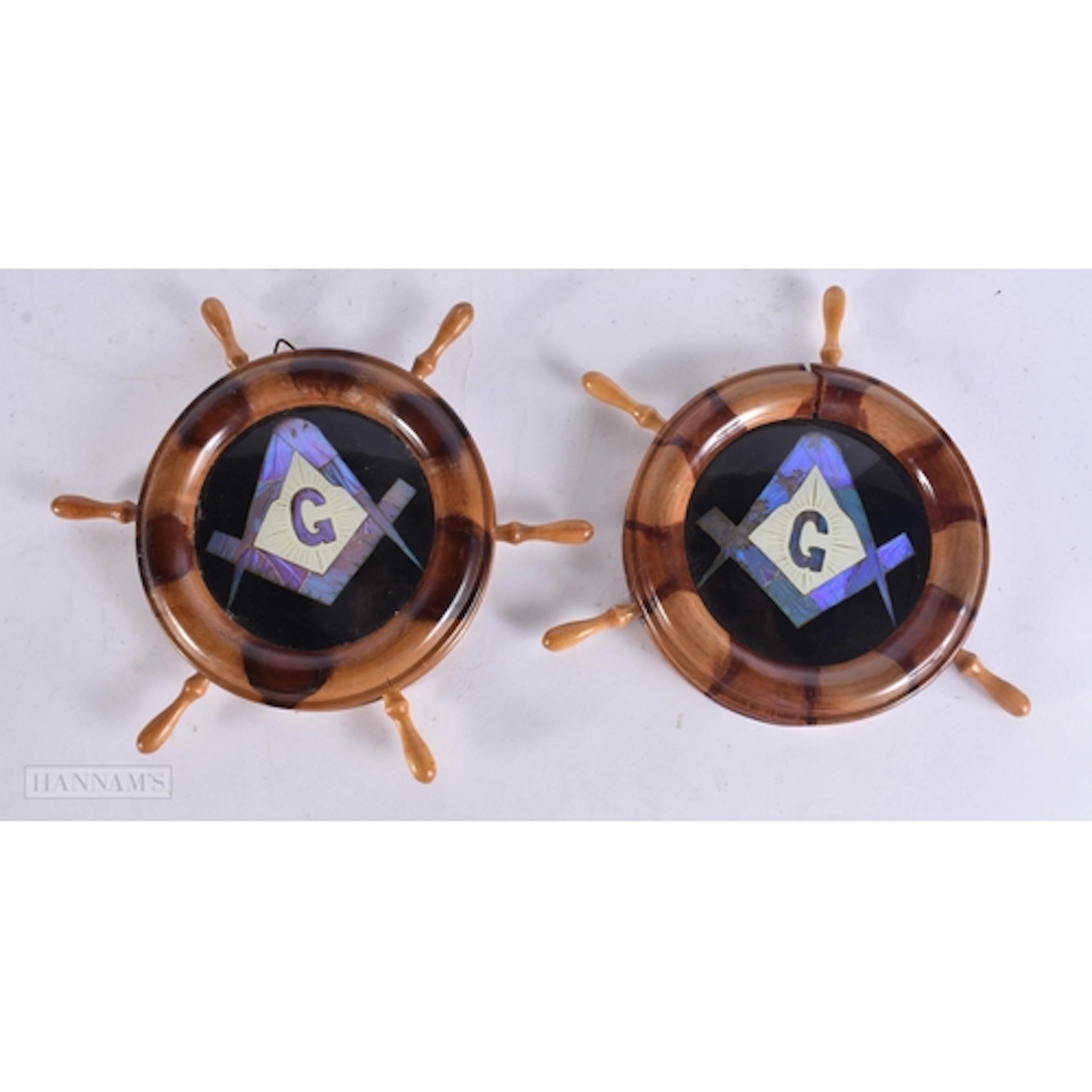AN UNUSUAL PAIR OF REVERSE PAINTED MASONIC GLASS SHIPS WHEEL...