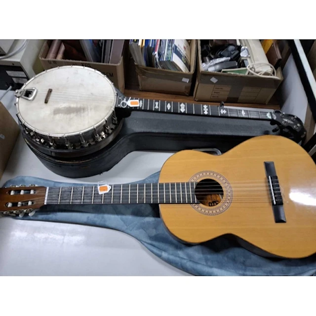 A GROUP OF TWO VINTAGE STRINGED INSTRUMENTS comprising a fiv...