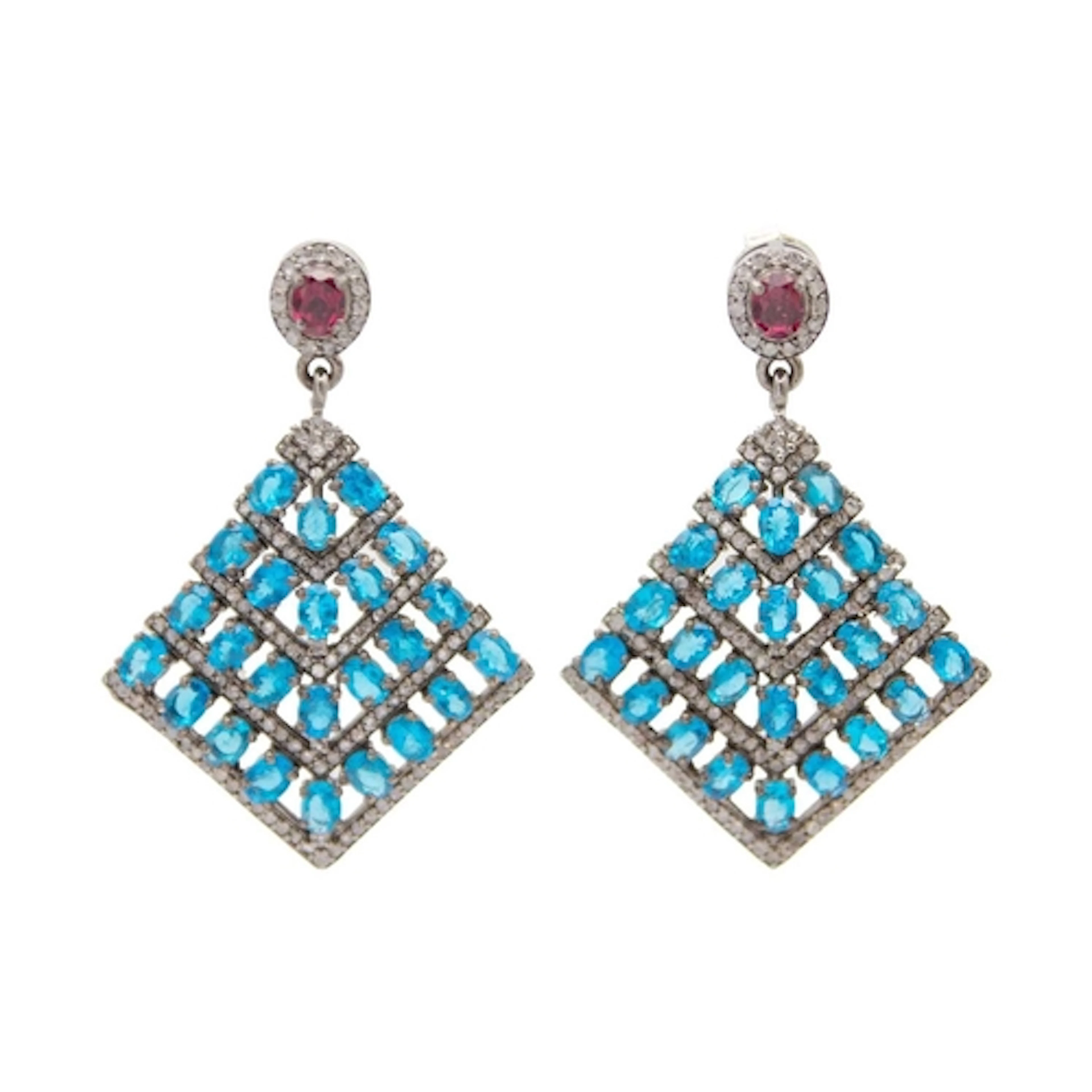 A pair of flared drop earrings with oval apatites, garnets a...