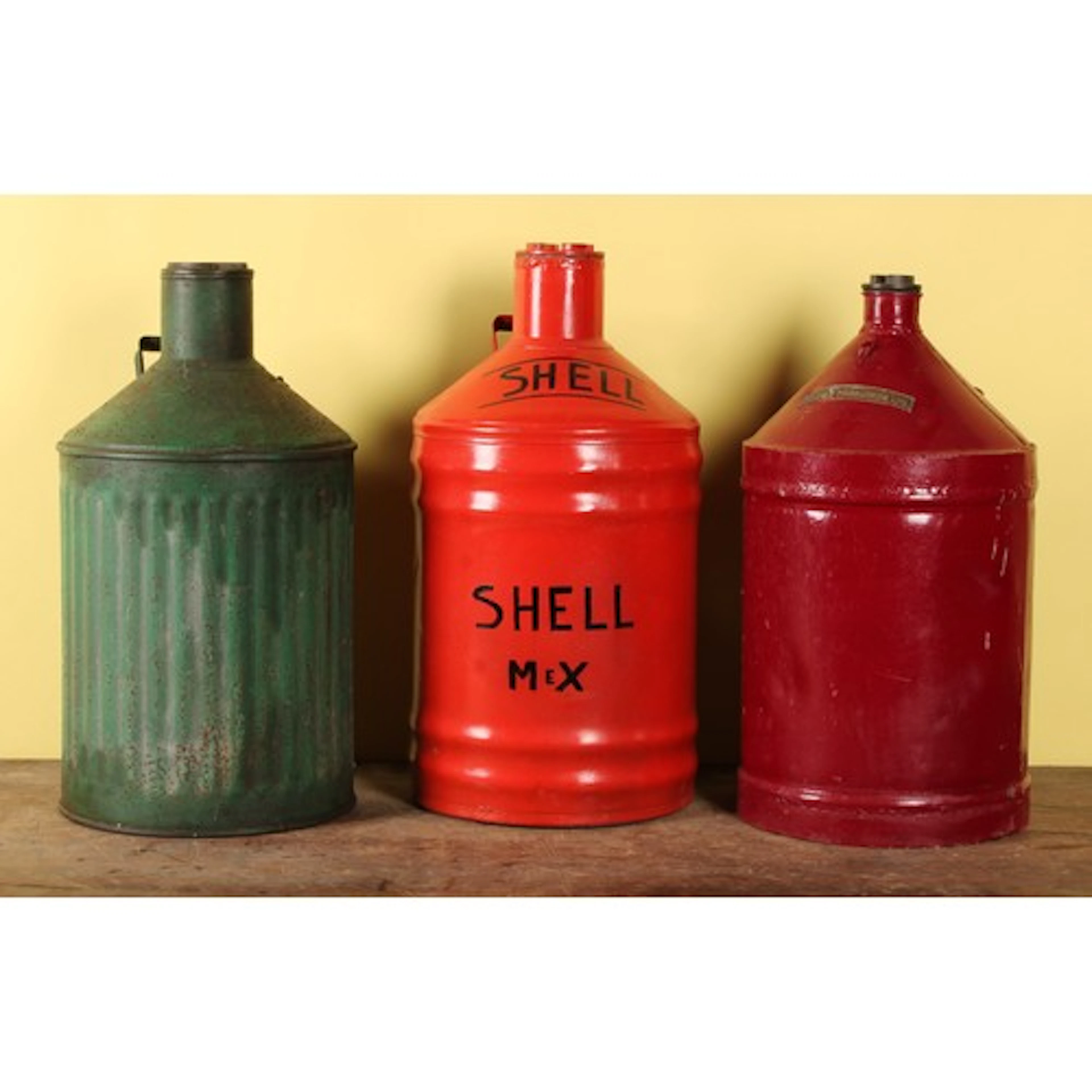 Petroliana - a vintage five gallon cylindrical oil can, appl...