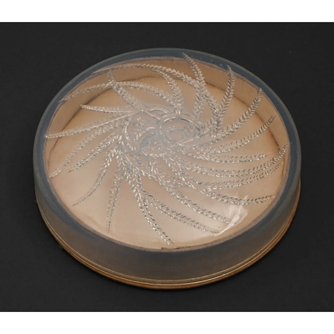 A Lalique semi-opalescent box and cover, for Houbigant, c192...