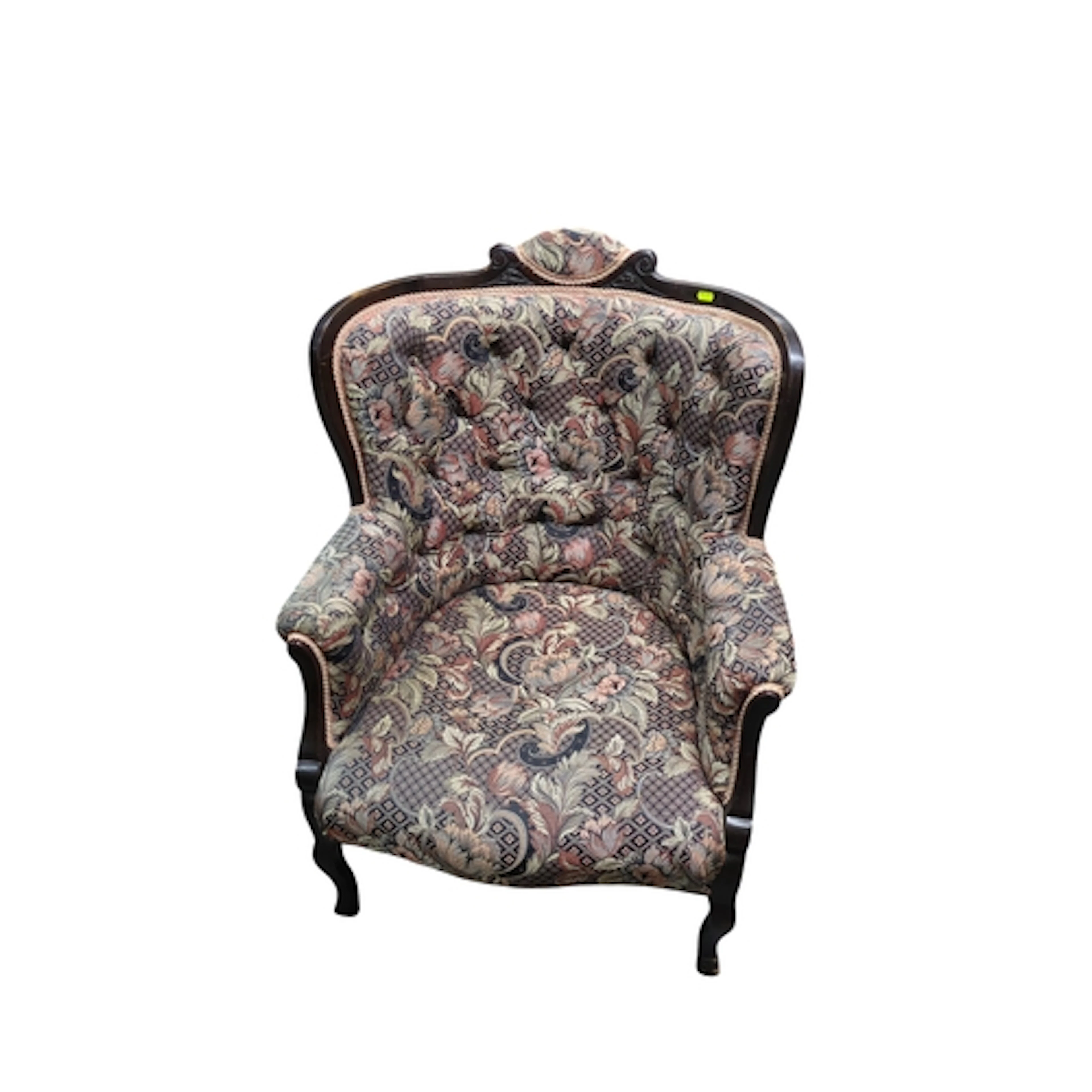 Victorian-style button-back armchair with a dark-stained sho...