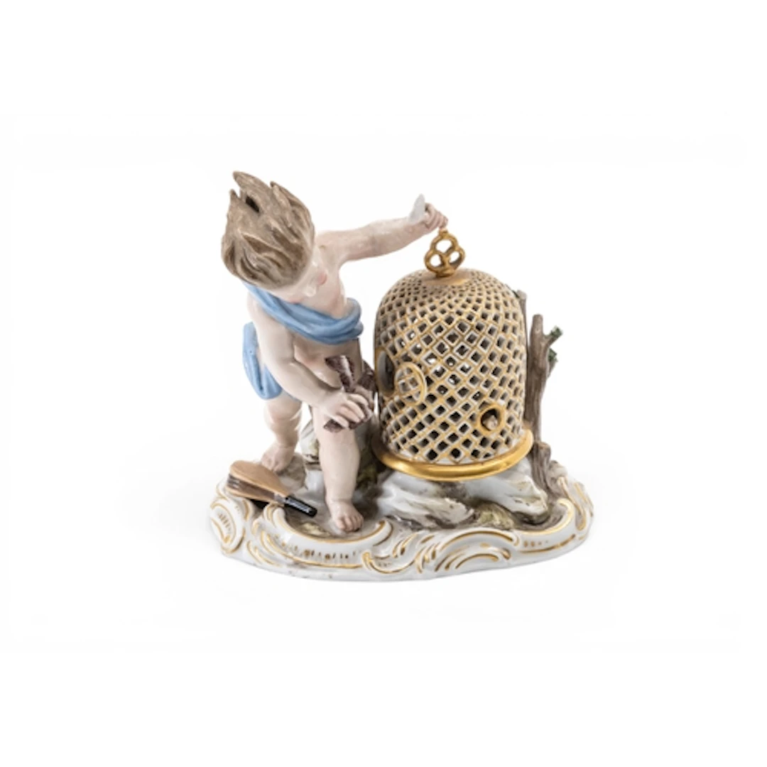 MEISSEN FIGURE of a Putto and a dove, placing the bird into ...