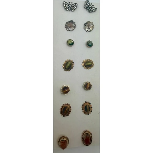 Seven pairs of earrings to include 9 carat gold mounted, tig...