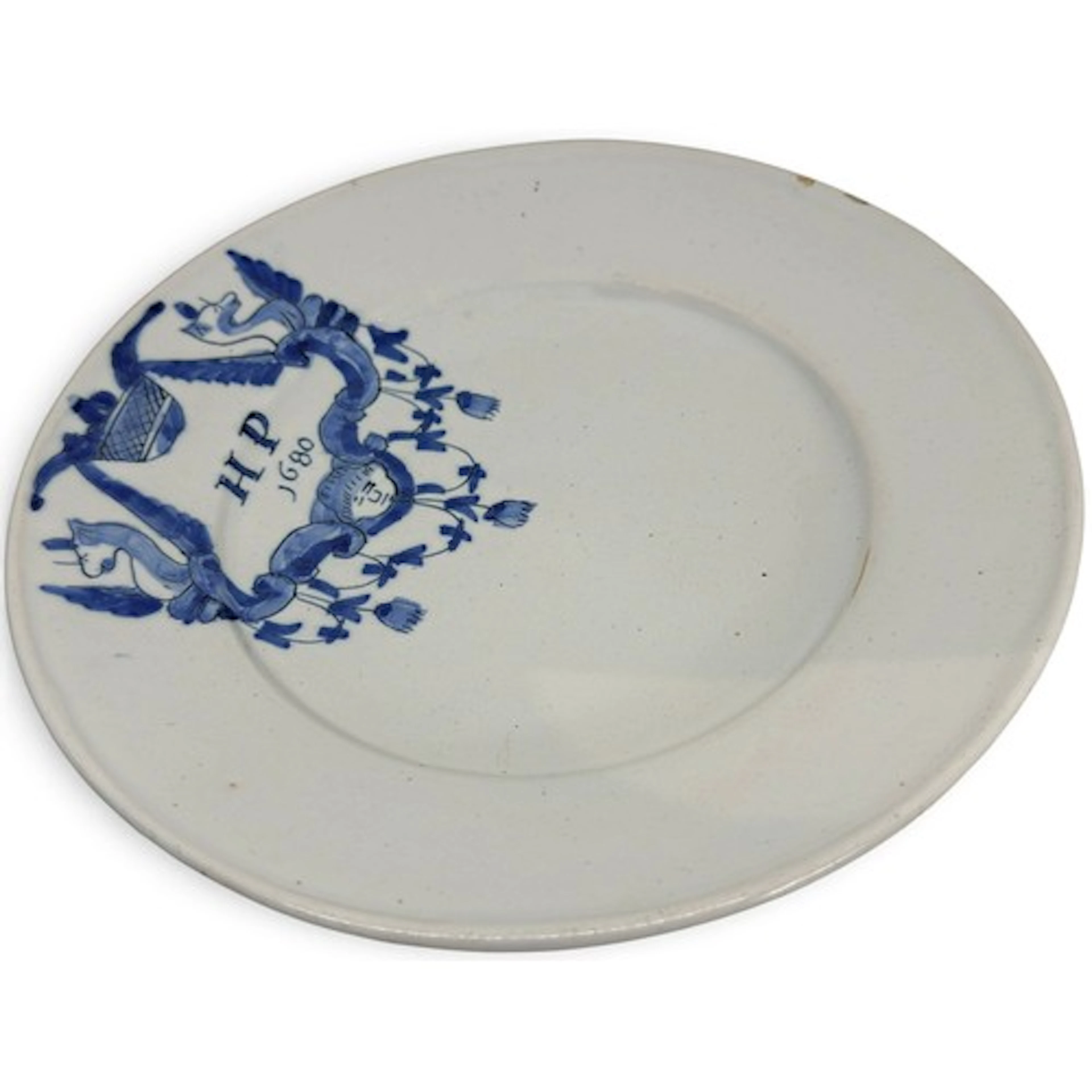 A Charles II period English blue and white Delft plate, with...