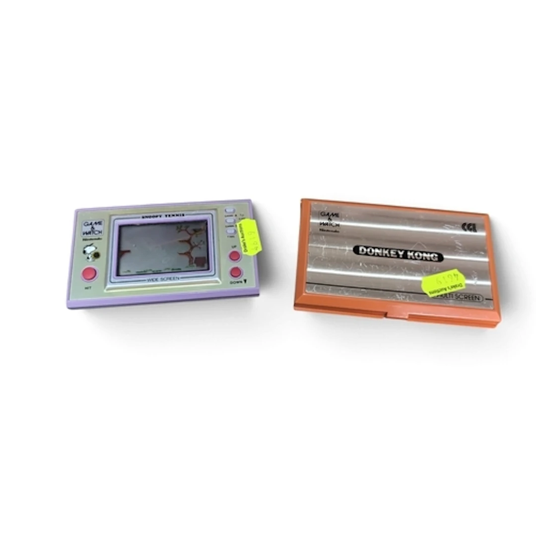A pair of Nintendo Game & Watch LCD handheld games: Snoo...