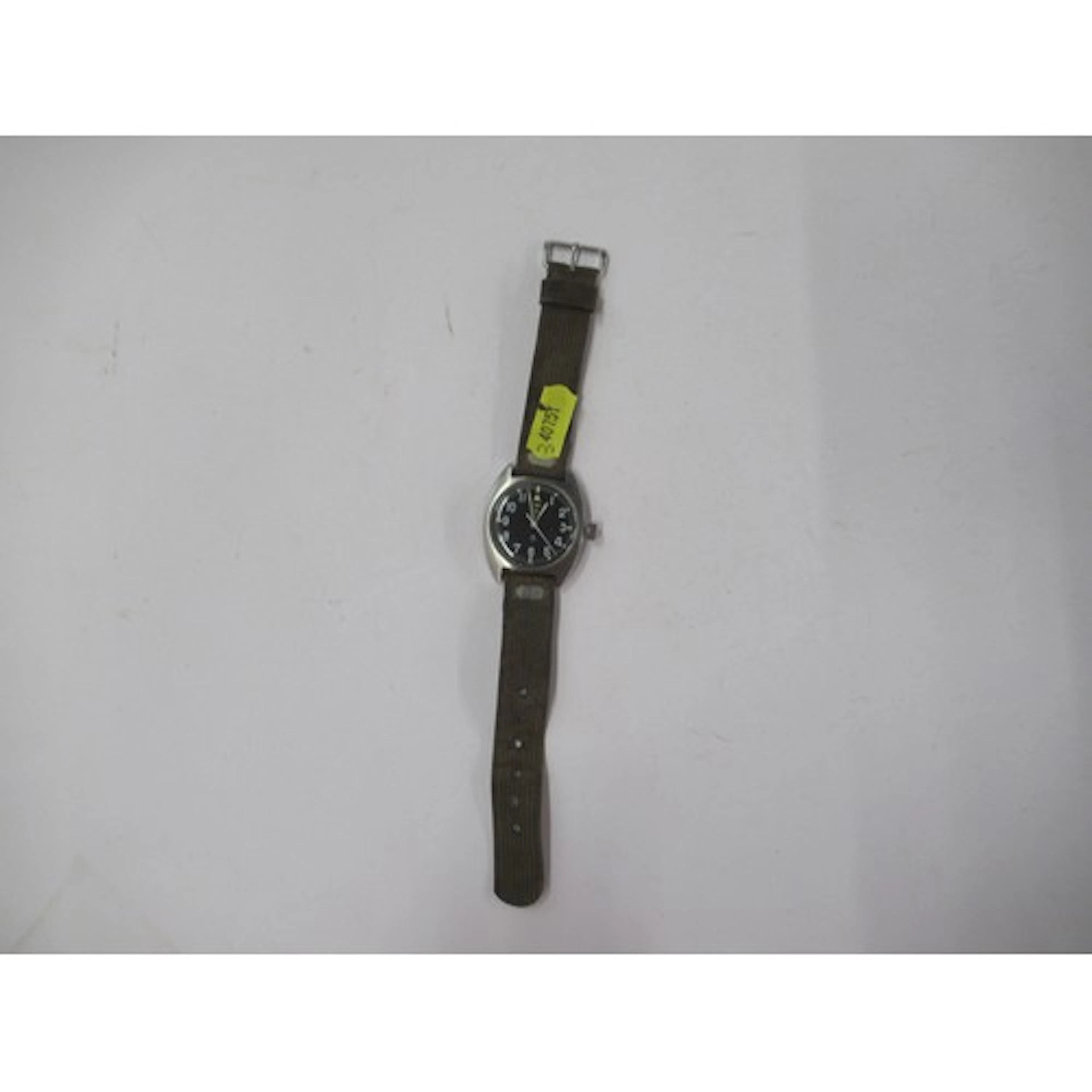 A CWC W10 Military issue wrist watch, with black dial, numbe...