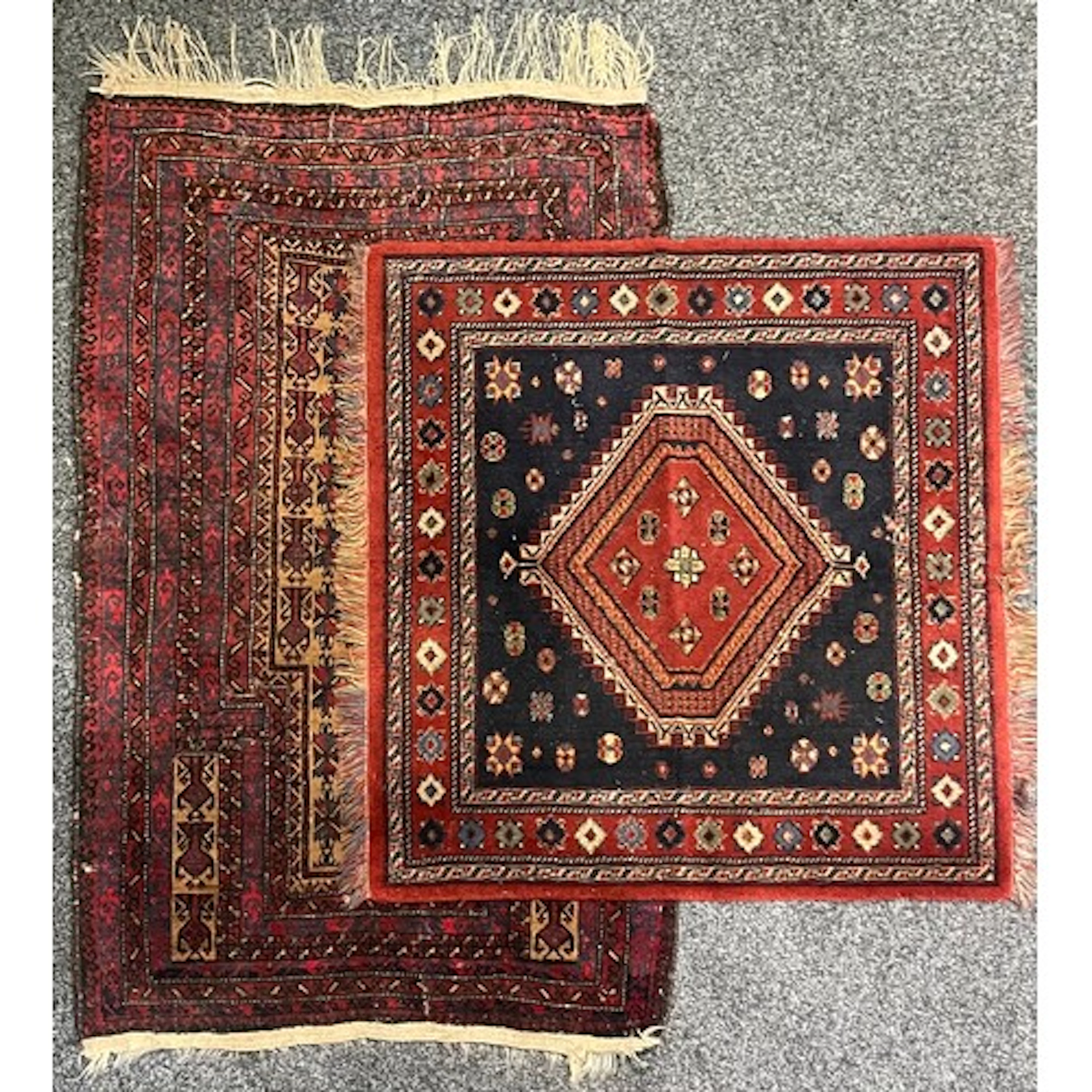 A Balouche wool rug or carpet, worked with geometric motifs ...