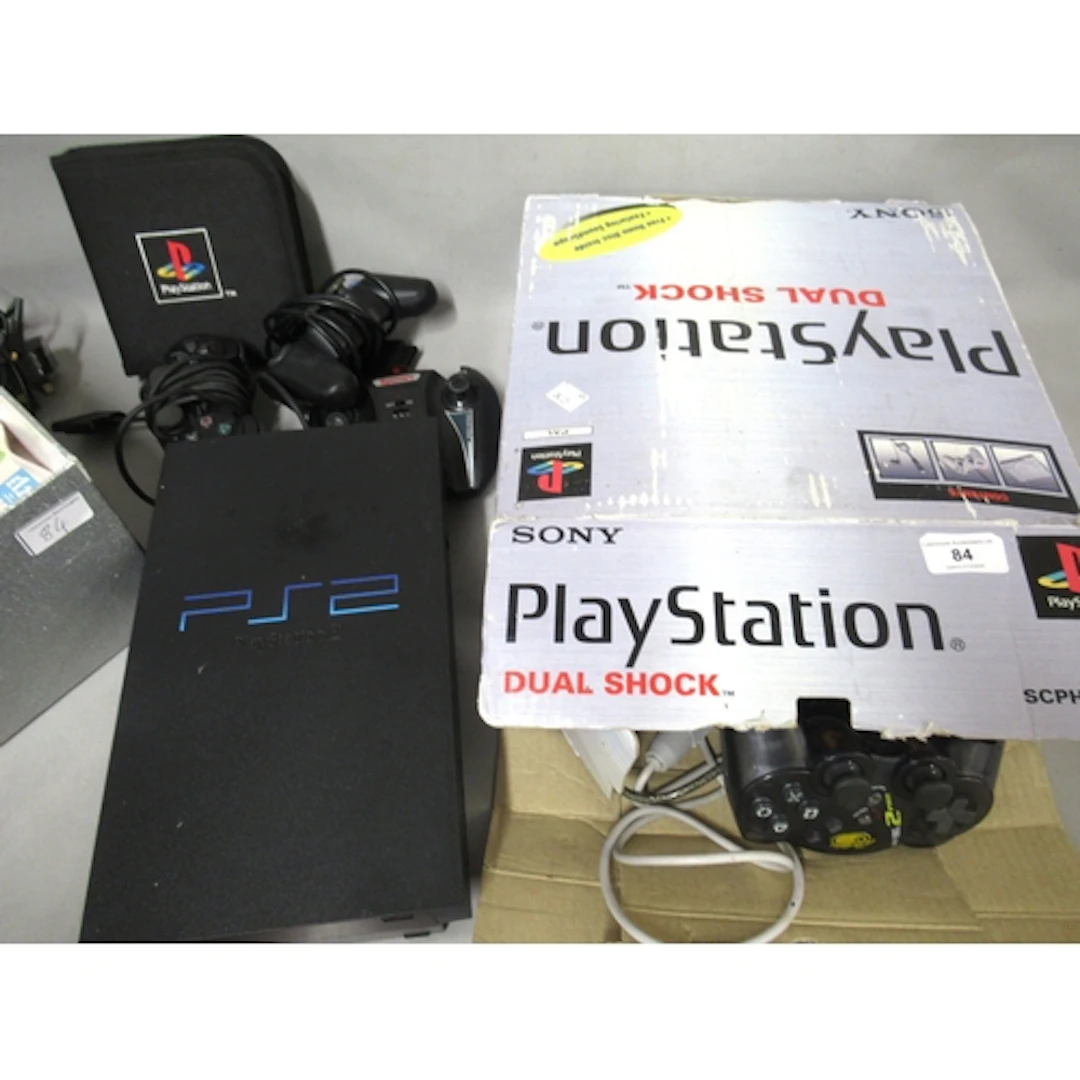 Sony PlayStation One and Two, with controllers