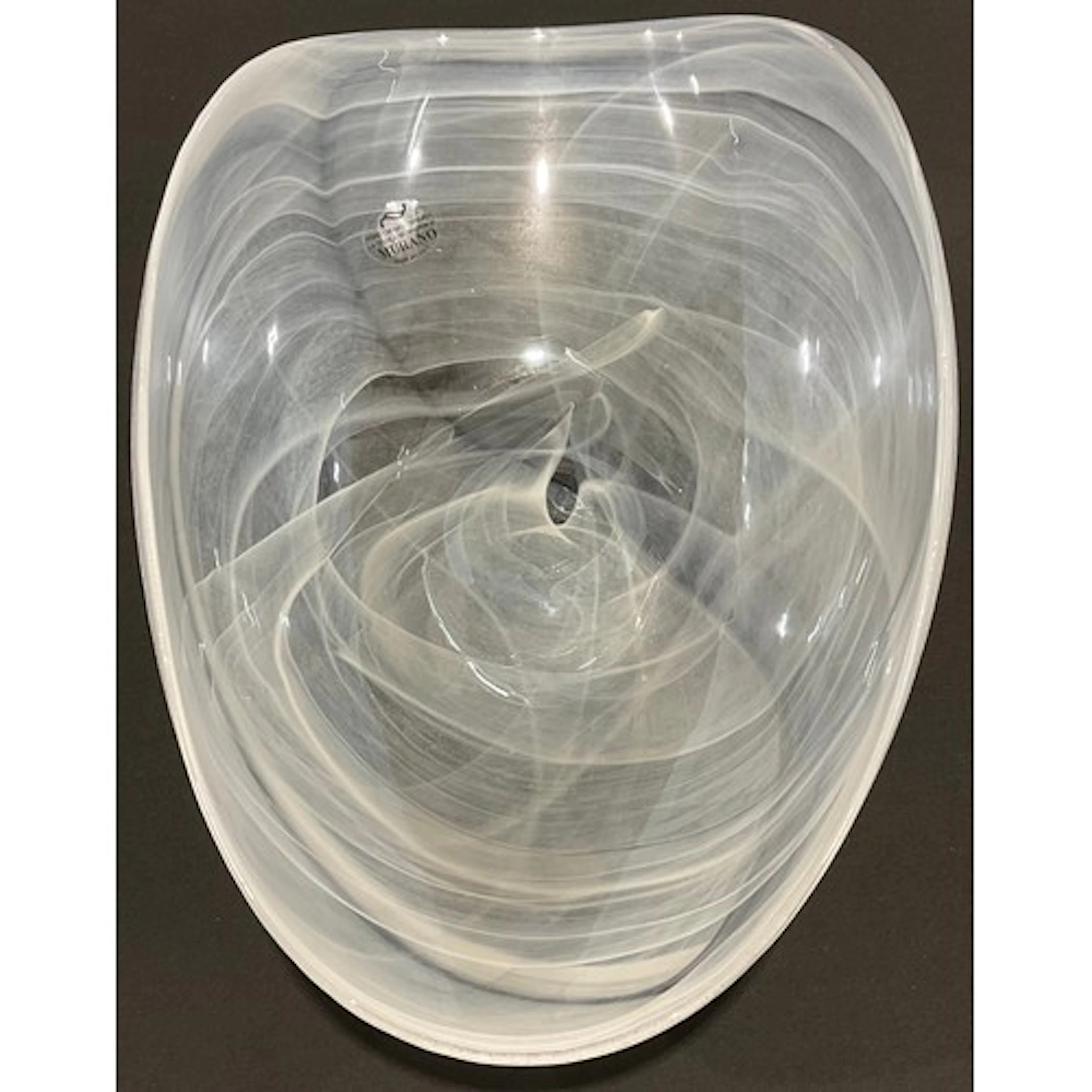 A large modern cloud glass table centre bowl, with white ban...