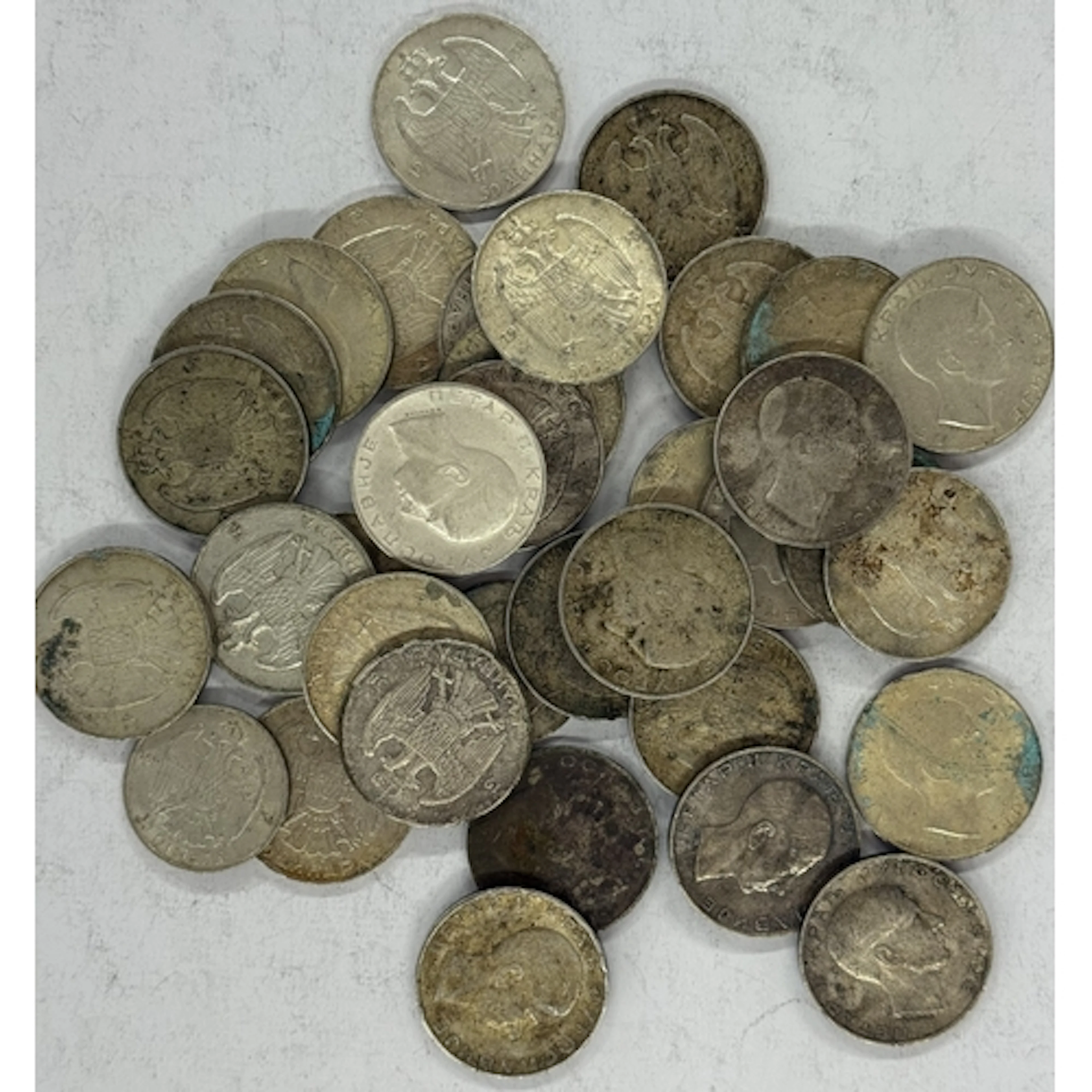 Coins: Yugoslavia 50 Dinara coins, condition varies from fin...