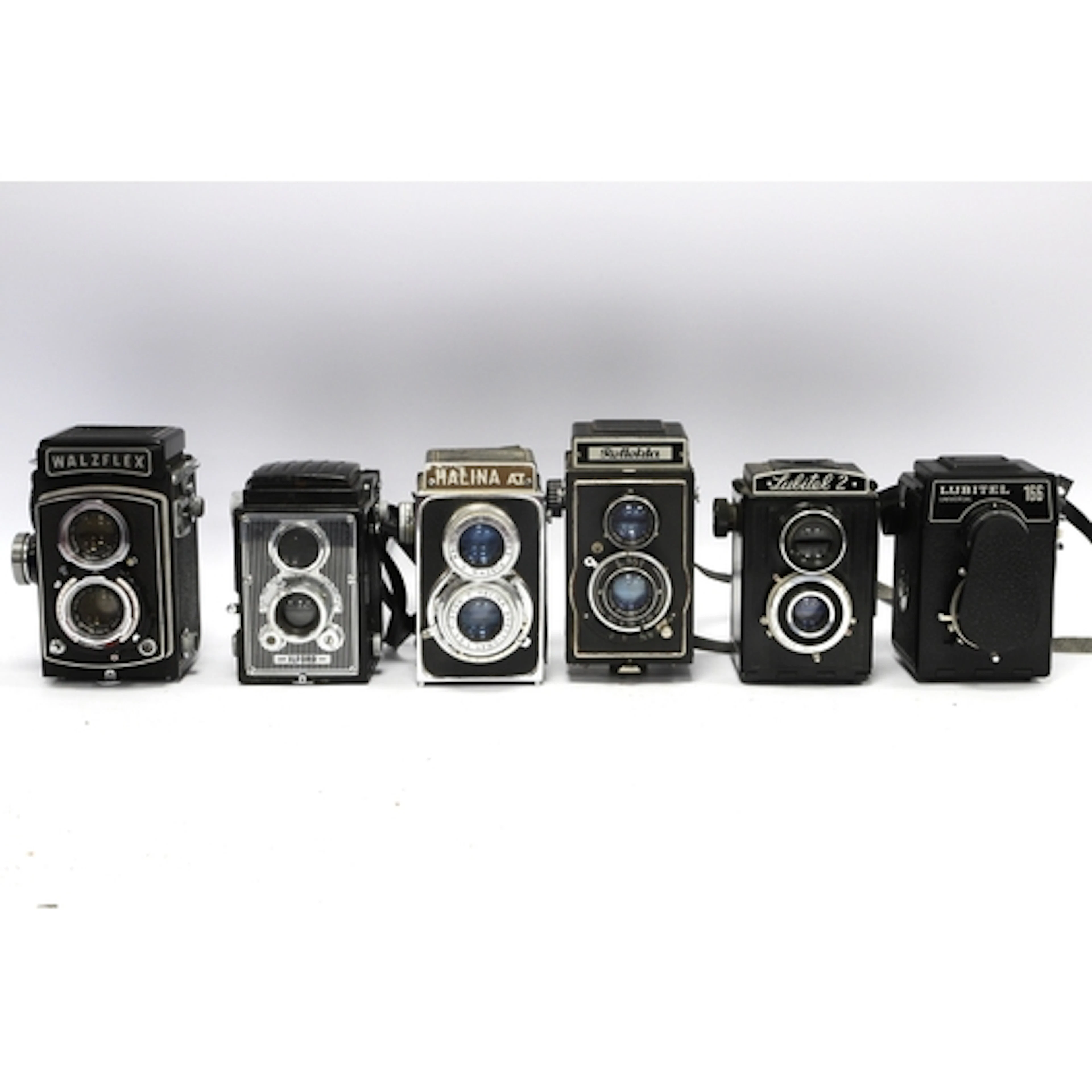 A collection of TLR Cameras to include Walzflex, Reflekta, H...
