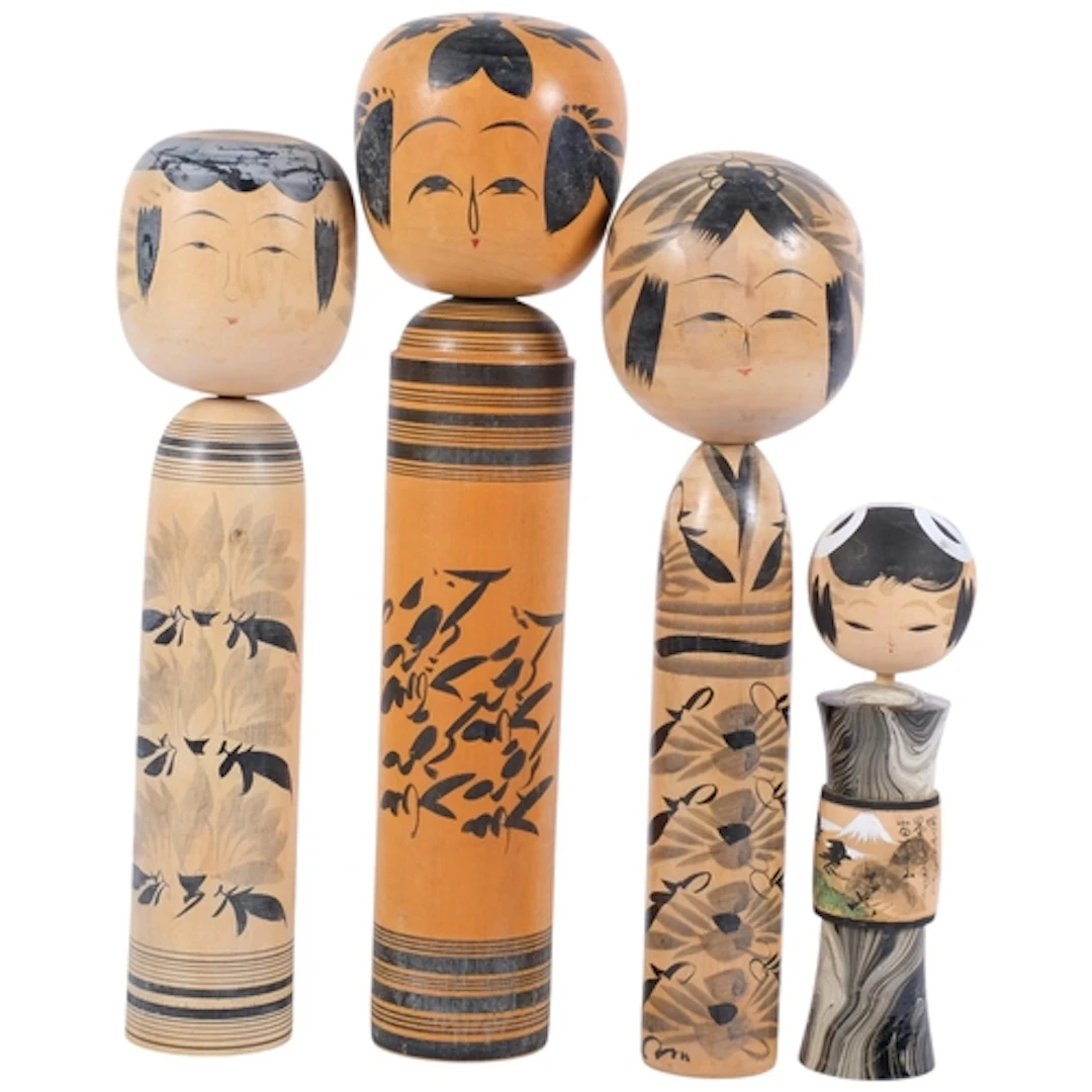 4 Japanese black and white painted Kokeshi dolls, tallest 41...