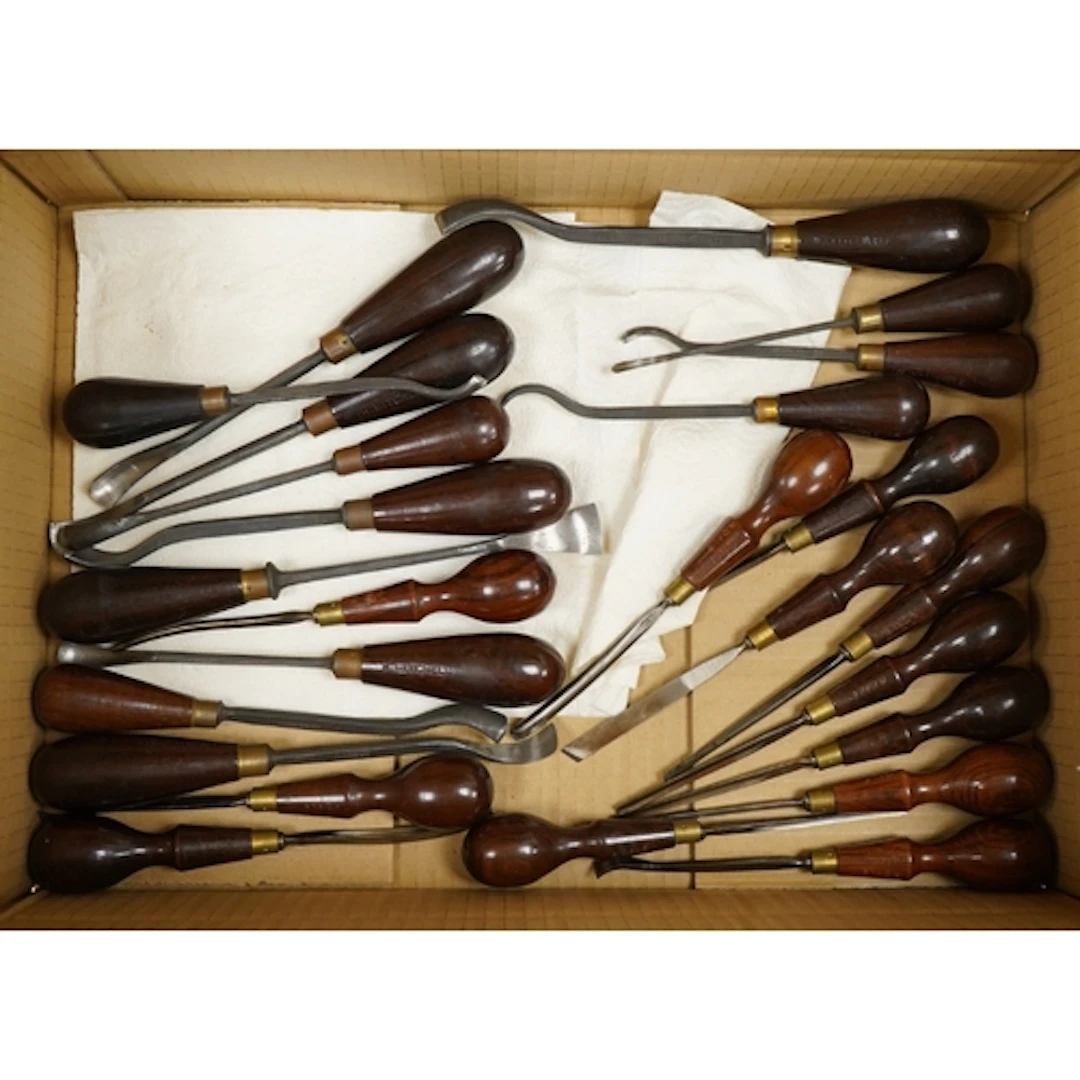 Twenty-five early 20th century gouges, including spoon gouge...